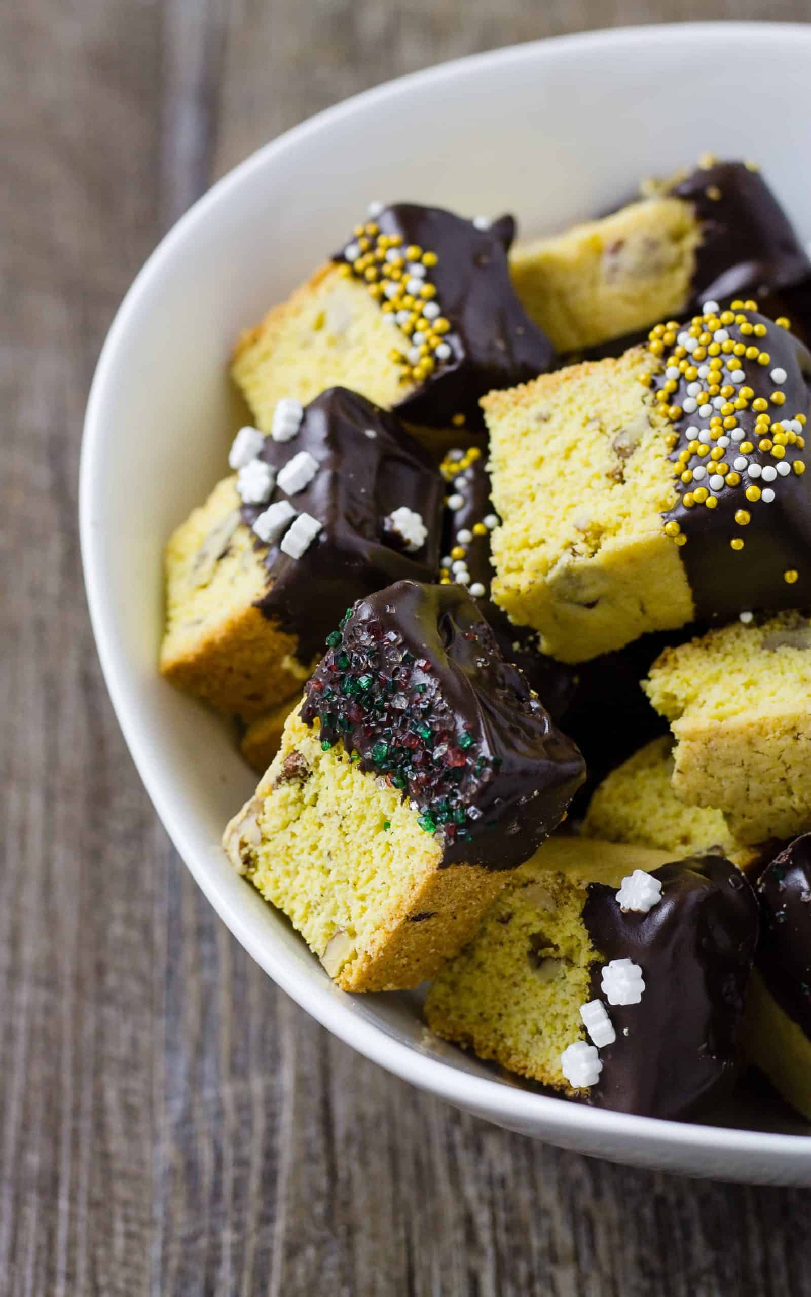 Cornmeal Biscotti Bites with Pecans and Chocolate in a white bowl