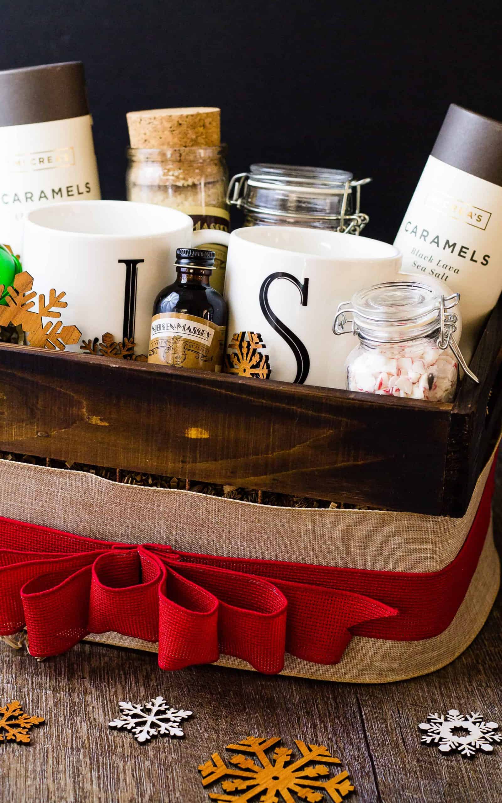 Side view of full gift basket with a big red bow around it.