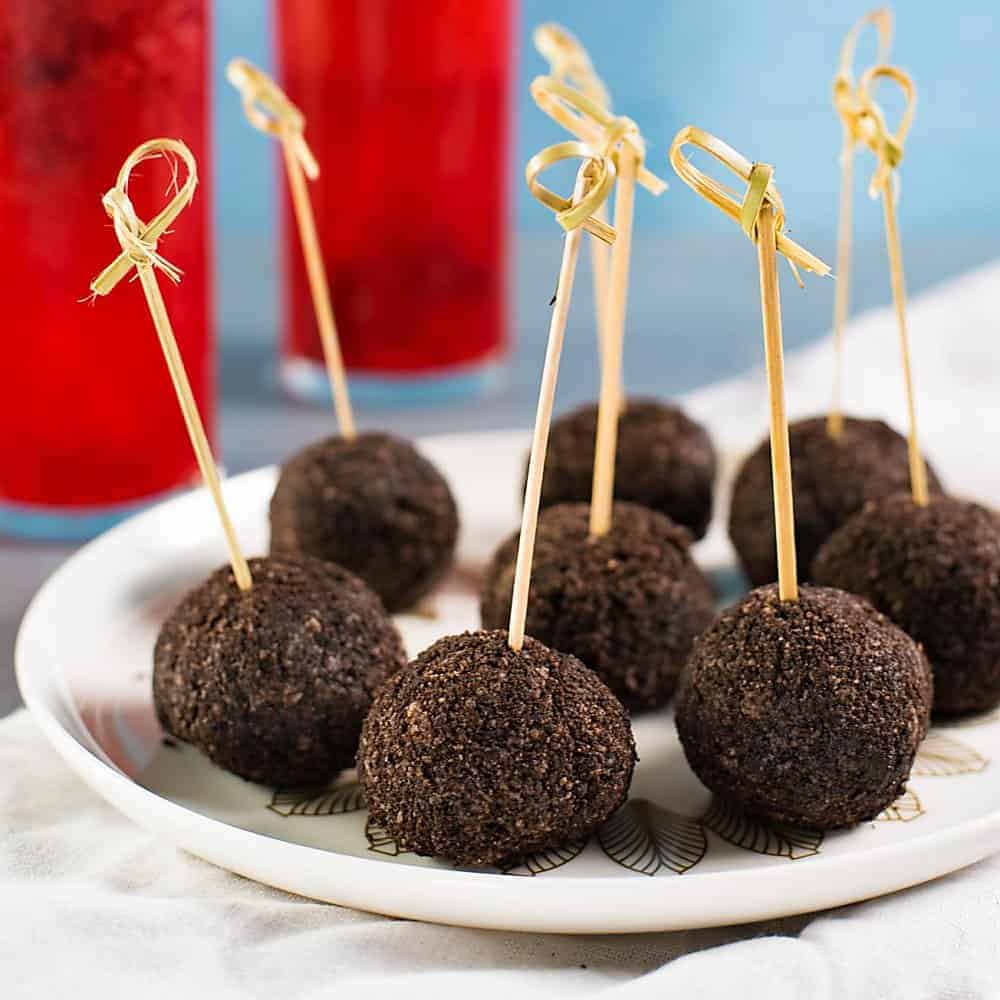 Deliciously Creamy No Bake Chocolate Cheesecake Bites, are perfect for any gathering - from holiday entertaining to party snacking. With a little bourbon, these boozy bite sized treats will be a devoured in minutes!