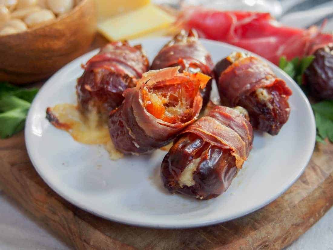 closeup of prosciutto wrapped dates