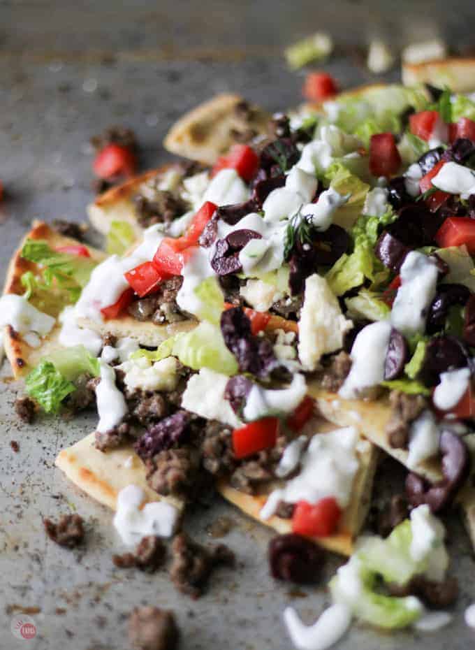 Close up of Greek Gyro Nachos on a sheet pan