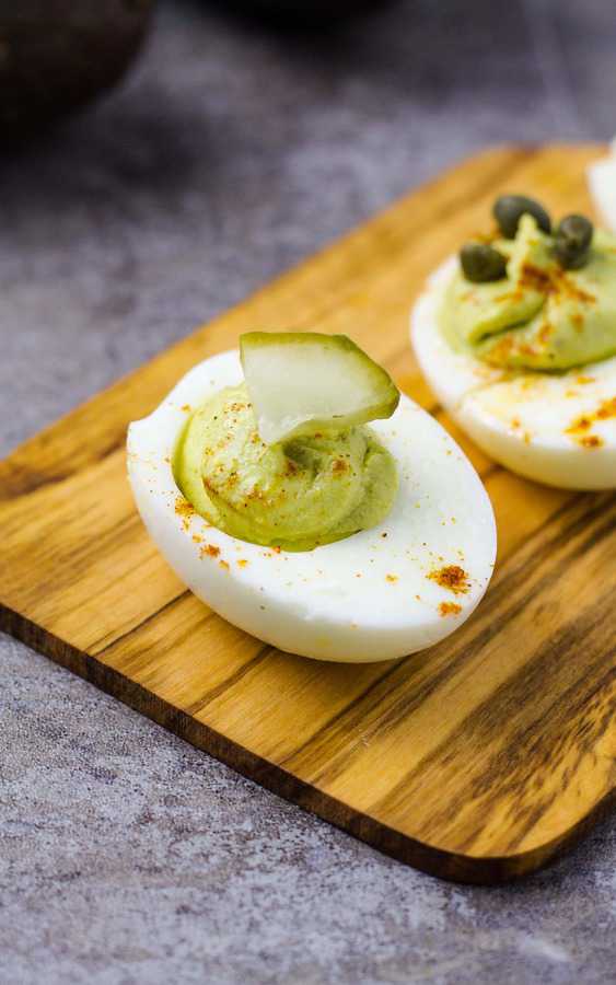 Avocado deviled egg on a cutting board