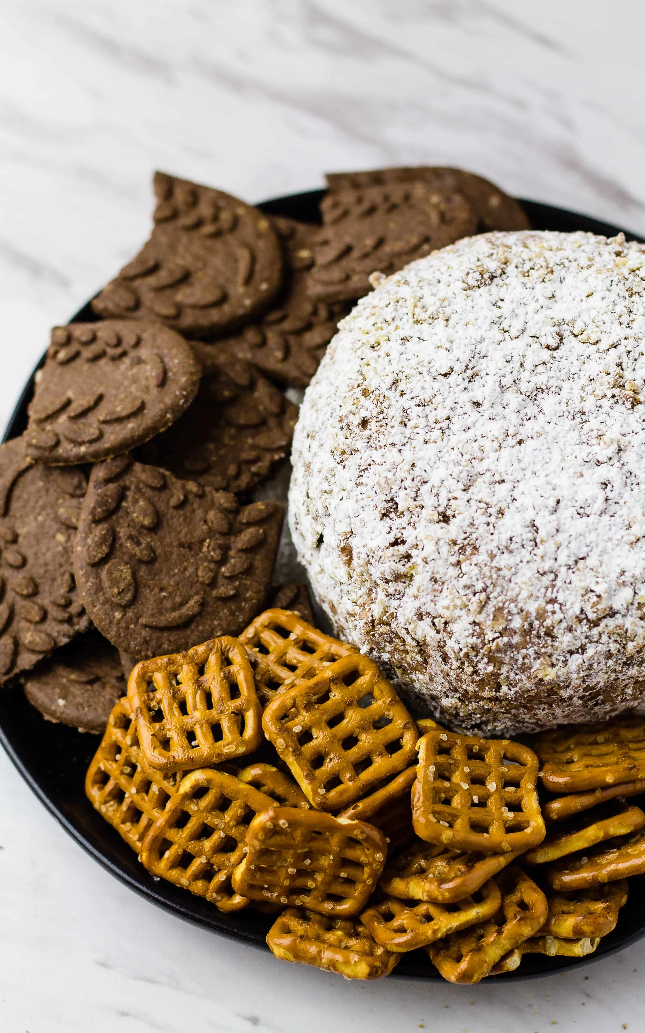 Chocolate, Peanut Butter, and Crispy Chex Cereal makes a great Puppy Chow Cheese Ball | Take Two Tapas | #PuppyChow #MuddyBuddies #ChexMix #SnackMix #CheeseBallRecipe #SweetCheeseBall #PuppyChowRecipe #MuddyBuddyRecipe