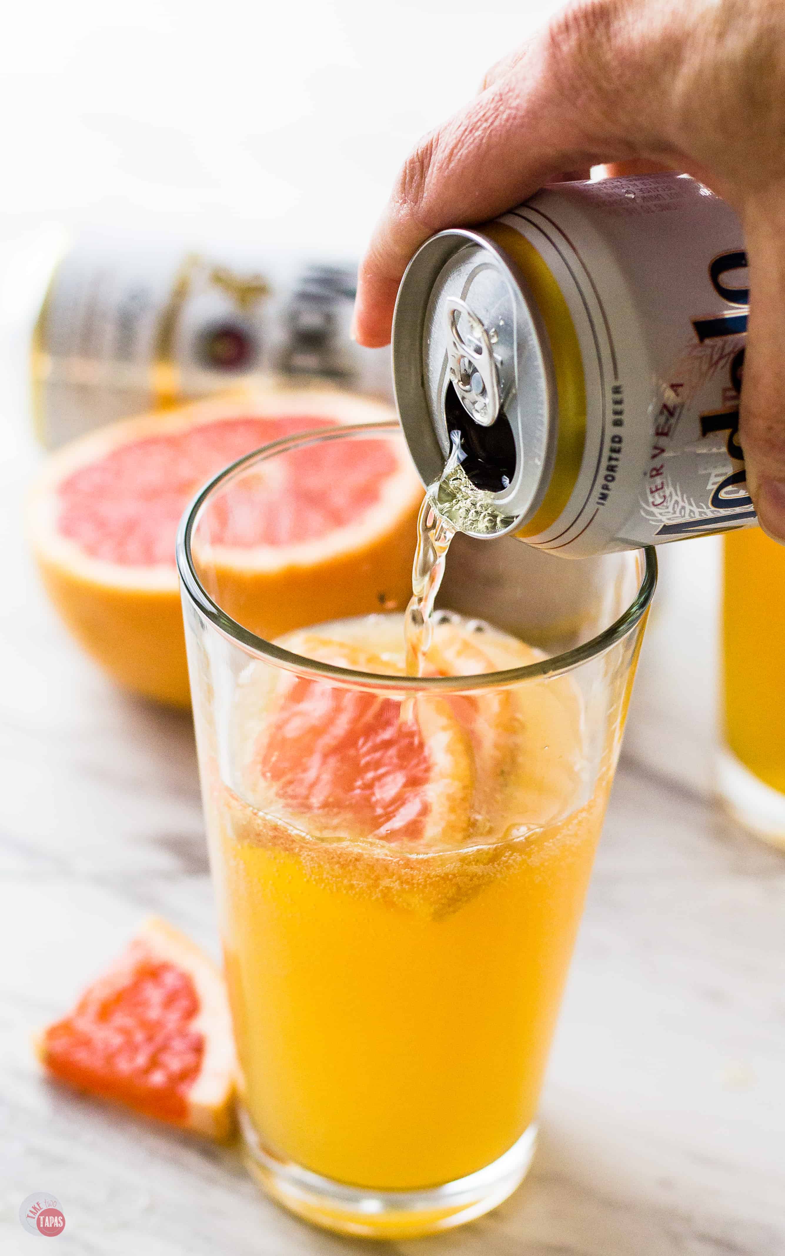 A bright summery grapefruit shandy beer cocktail | Take Two Tapas | #ShandyRecipe #grapefruit #cocktail #Beer #AD #CelebratorySips #CelebrateWithModelo