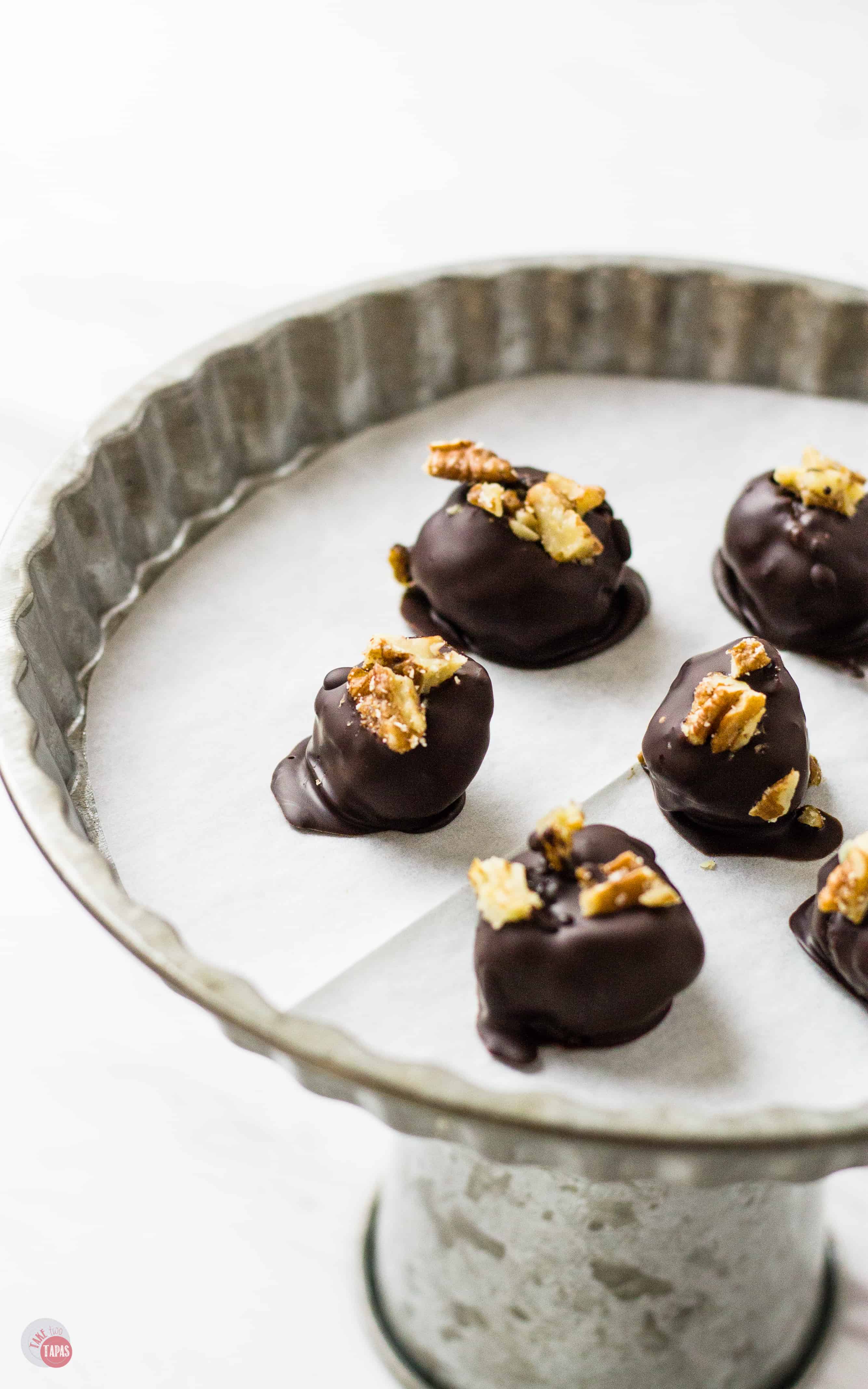 Dark Chocolate Covered Kentucky Derby Pie Bites on a plate