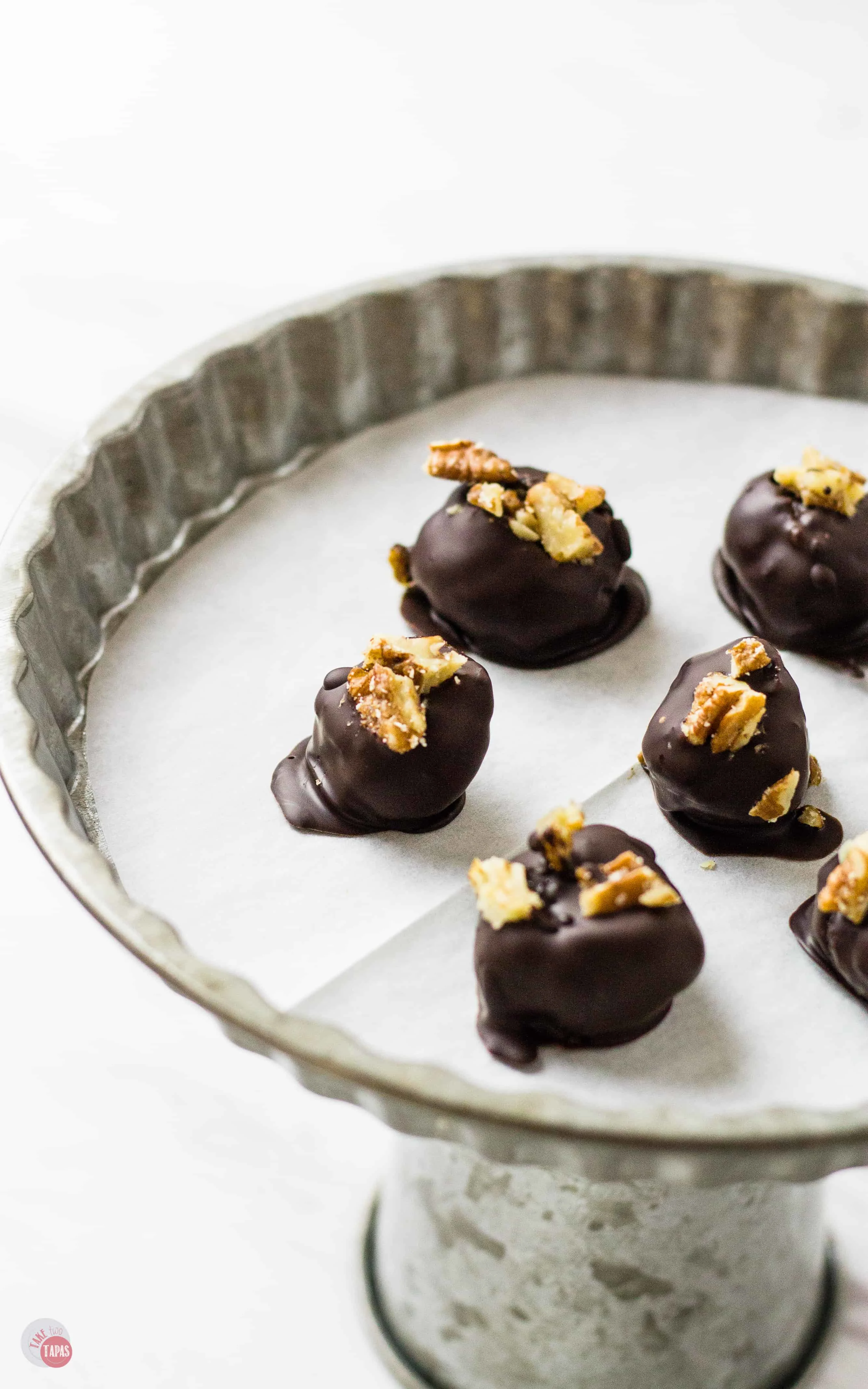 Dark Chocolate Covered Kentucky Derby Pie Bites on a plate