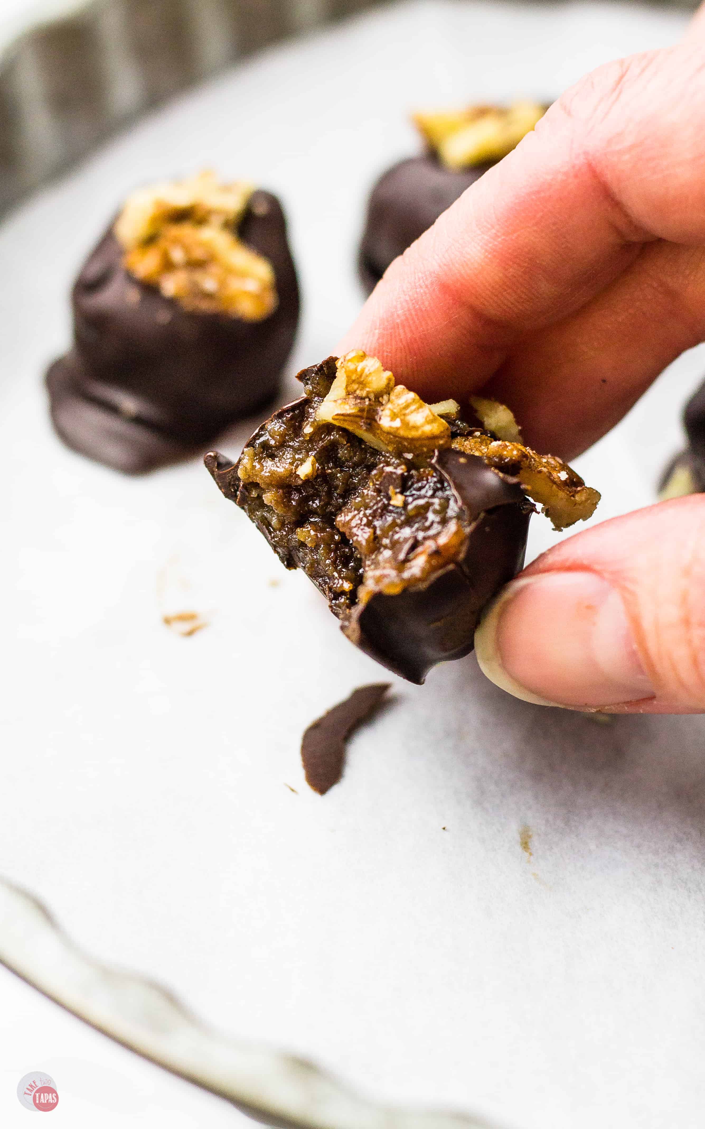 hand holding a truffle