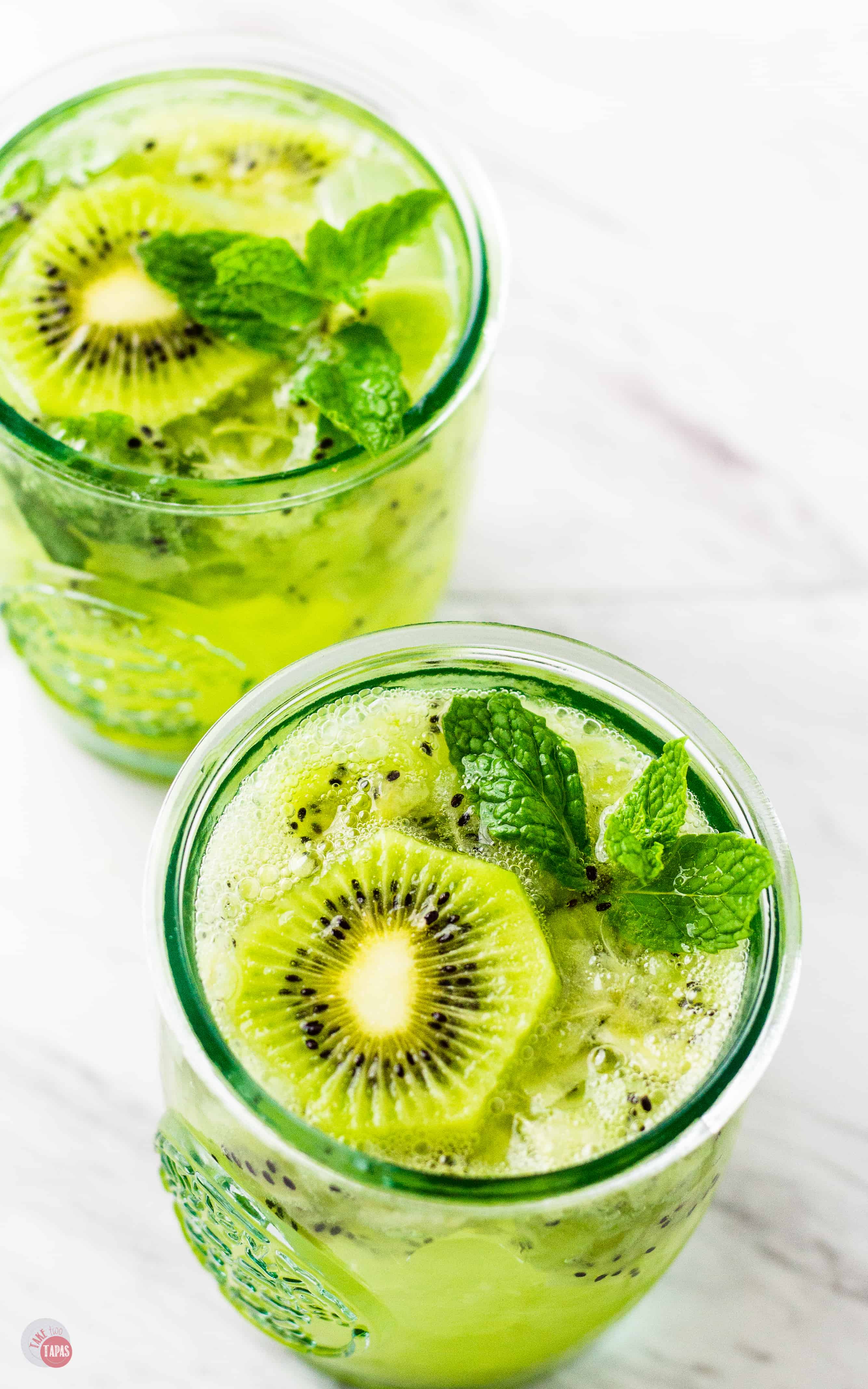 A tart and bright Kiwi Mint Mojito | Take Two Tapas | #MojitoRecipe #Mojito #kiwi #rum #mint