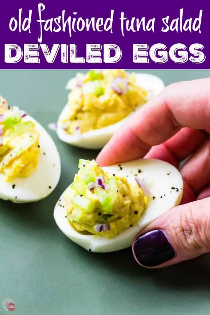 Pinterest image of hand holding egg and text "Old Fashioned Tuna Salad Deviled Eggs"