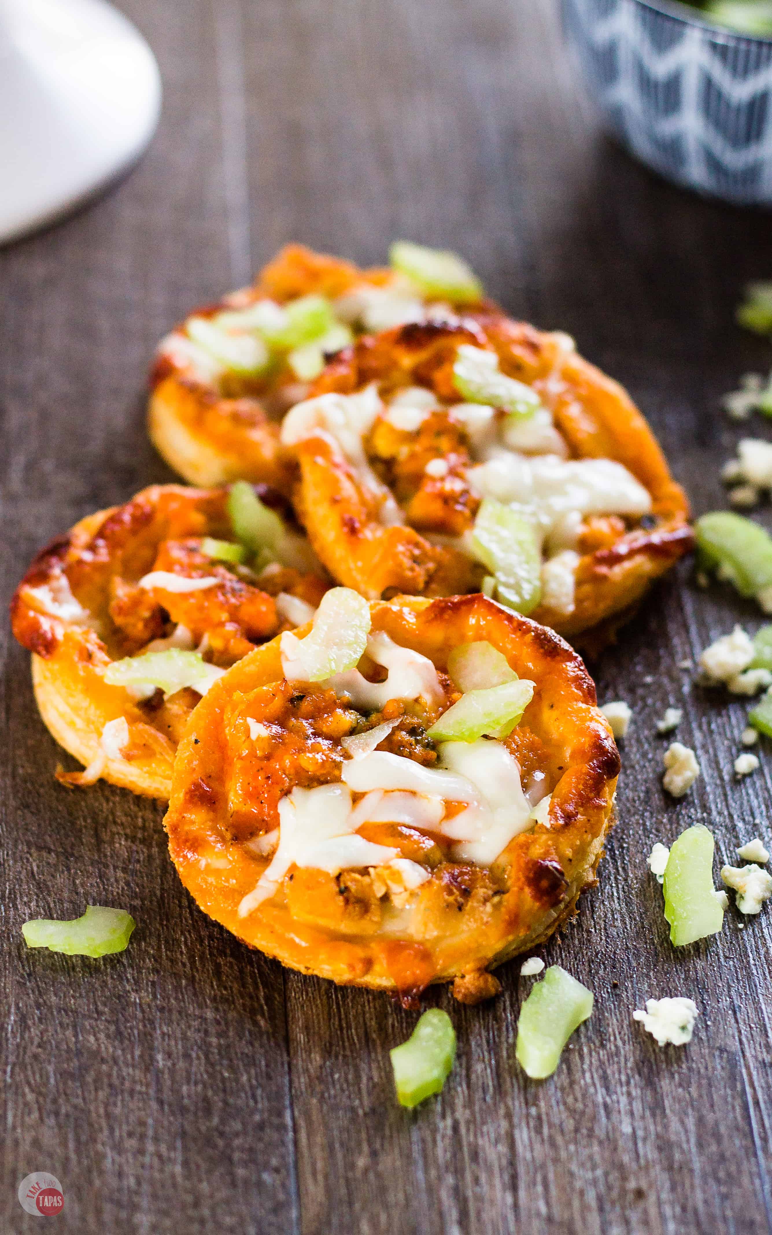 Delicious and easy to make BBQ Buffalo Chicken Tart - Mini Pizza | Take Two Tapas | #BuffaloChicken #pizza #tart #BlueCheese #HotSauce #GameDayRecipes #Appetizers #PuffPastry