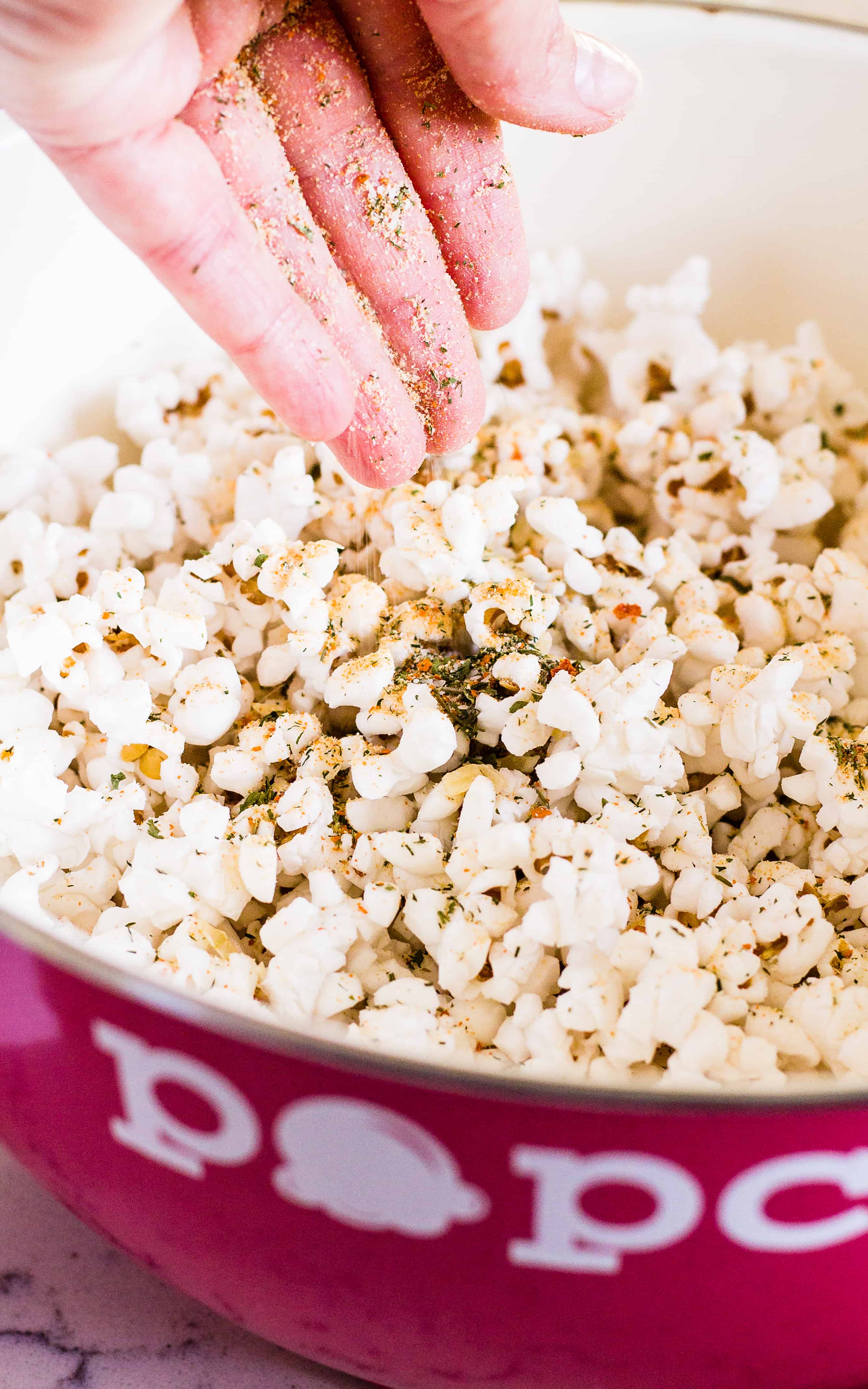 Sprinkle on the homemade Buffalo Ranch Seasoning on your Buffalo Ranch Popcorn | Take Two Tapas | #BuffaloRanch #PopcornRecipes #HealthyPopcornRecipes #HotSauce #BuffaloRanchPopcorn