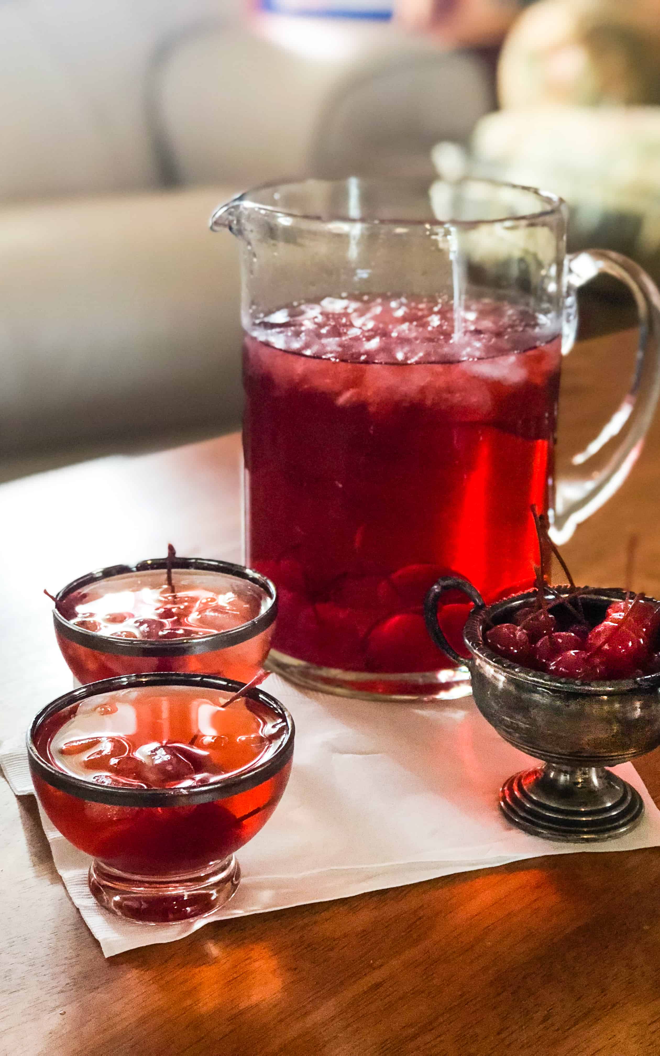 Cherry, bourbon, and orange pair perfectly with bubbly sparkling water to make my Cherry Manhattan Punch!