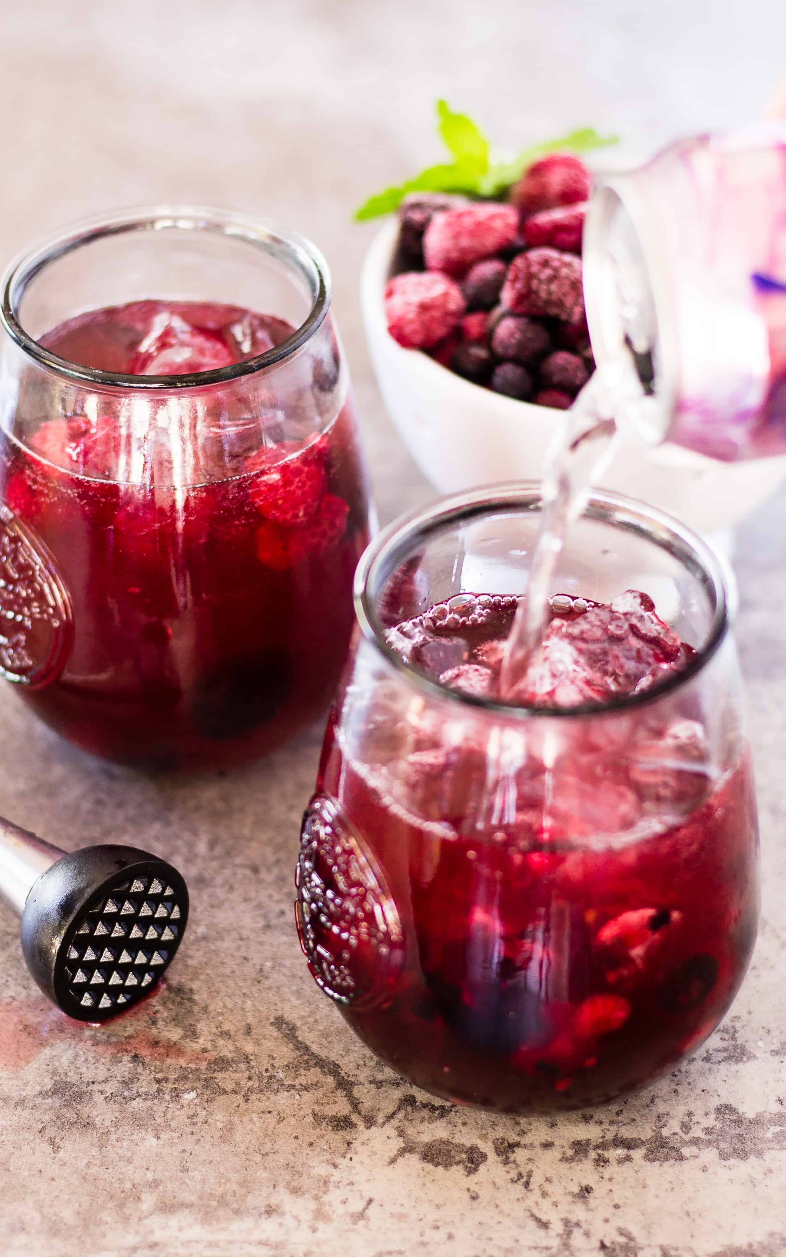 Sparkling Water makes the Skinny Sangria Spritzer | Take Two Tapas | #Sangria #Spritzer #SkinnyCocktails #WineCocktails #EasyCocktails #SimpleCocktails