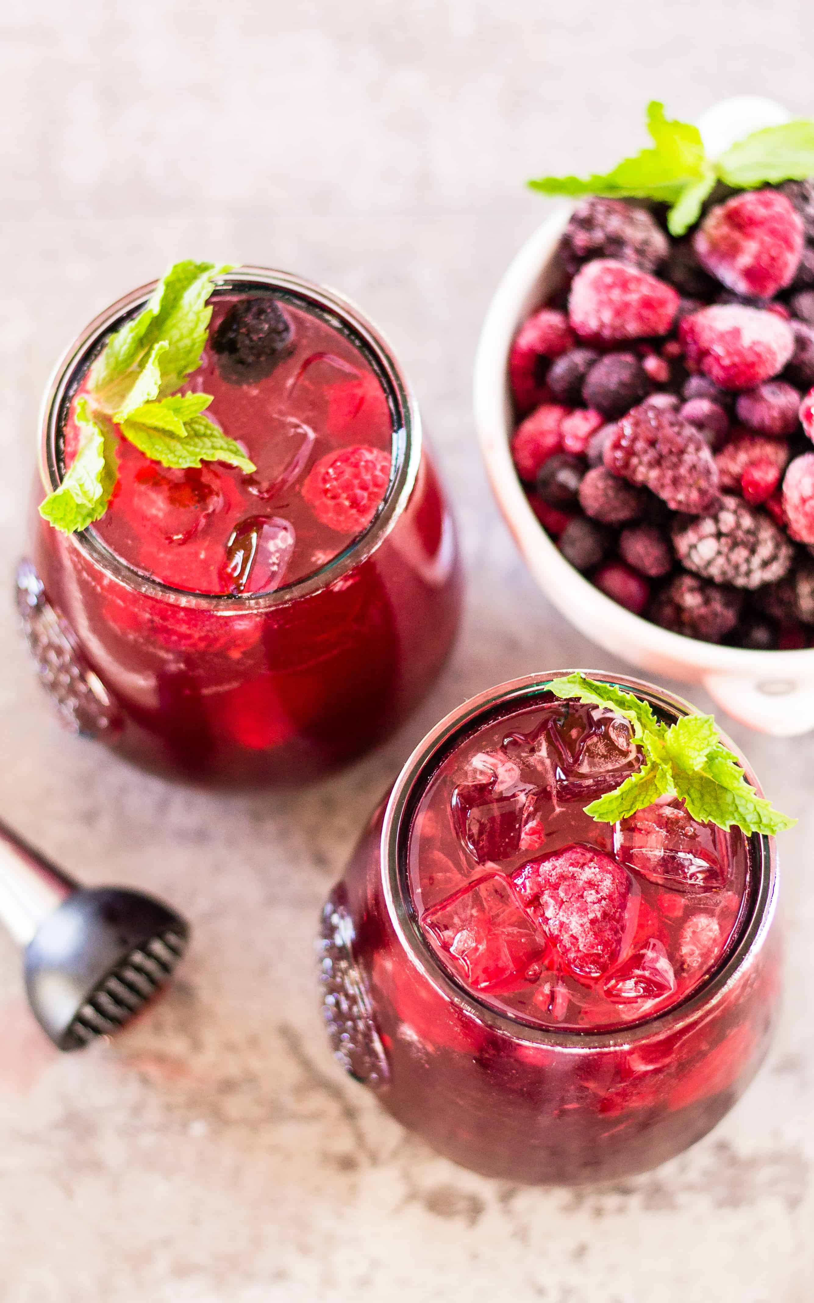 Skinny Sangria Spritzer is perfect for a large batch punch too! | Take Two Tapas | #Sangria #Spritzer #SkinnyCocktails #WineCocktails #EasyCocktails #SimpleCocktails