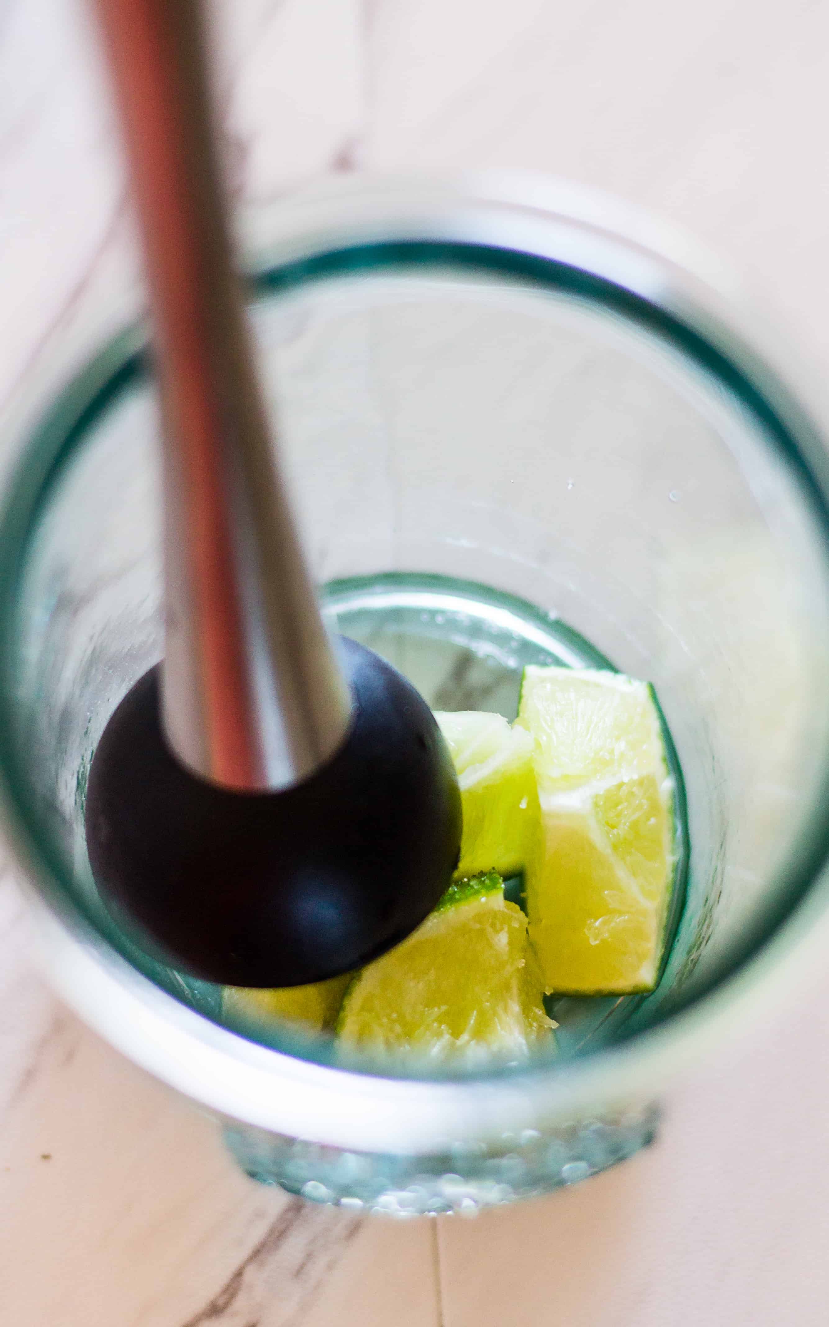 The sugar helps to juice the limes in this Spicy Jalapeño Caipirinha Cocktail 