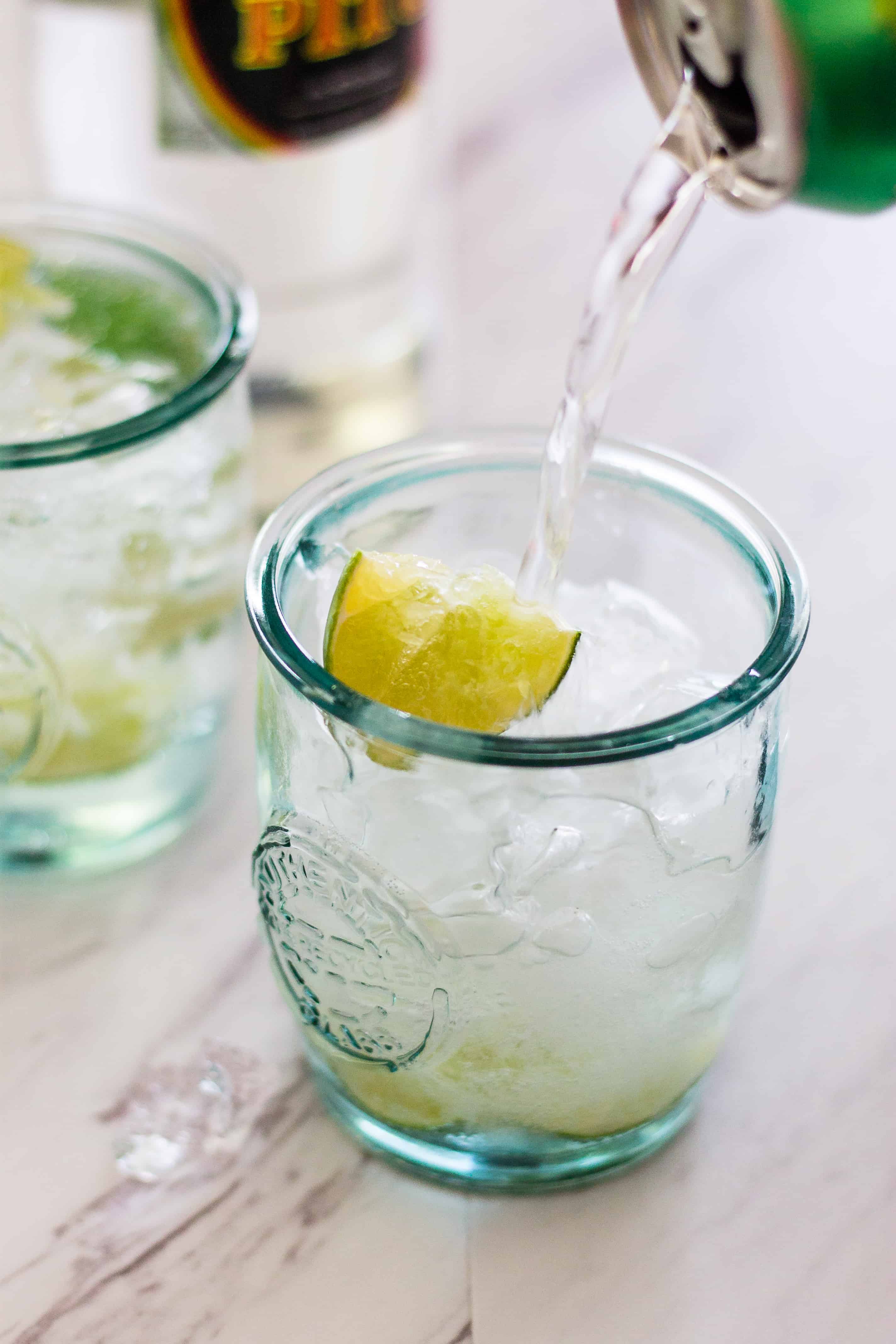 Lime Sparkling water helps to tame the jalapeño in this Caipirinha Cocktail