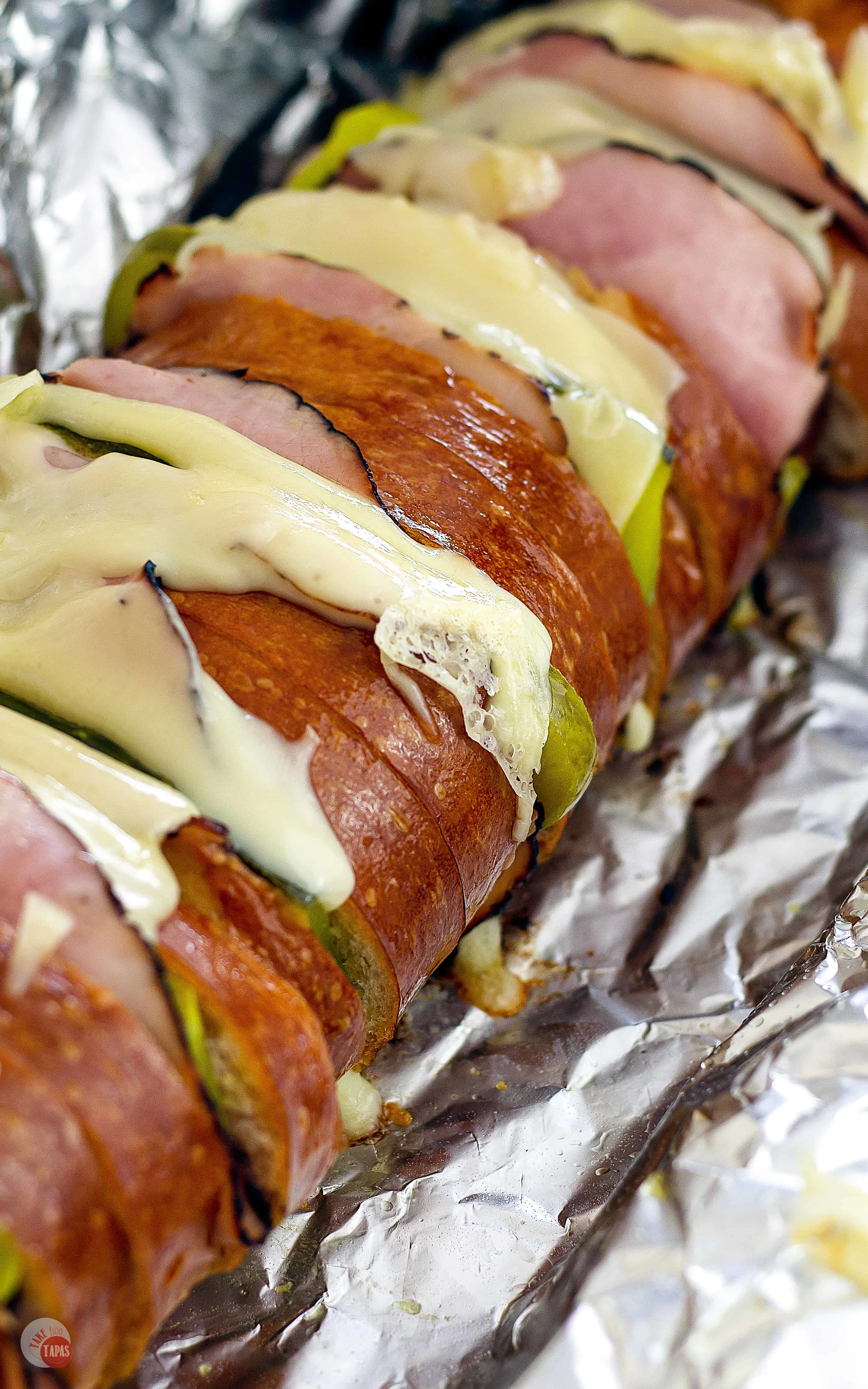 Make Ahead Cuban Sandwich Loaf for a Crowd - Tailgating Sandwiches | Take Two Tapas | #TailgatingSandwiches #GrillRecipes #LargeSandwiches #CubanSandwich #CubanSandwichLoaf #GrillSandwiches #MakeAheadTailgateRecipes