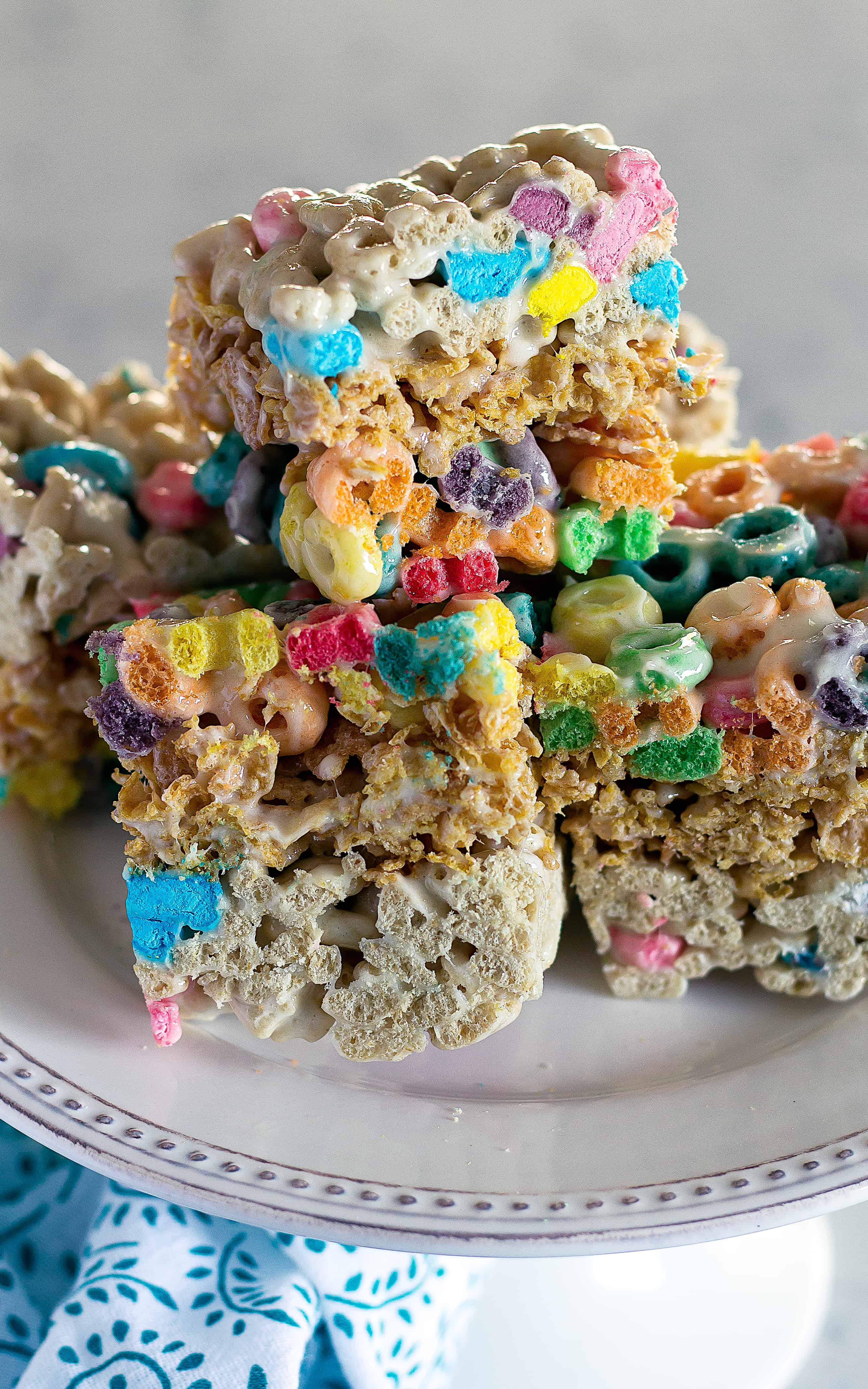 Layered Cereal Bars with Marshmallow | Take Two Tapas | #CerealBars #KrispiesTreats #FruitLoops #FrostedFlakes #LuckyCharms #CerealRecipes #KidsTreats #AfterSchoolSnacks