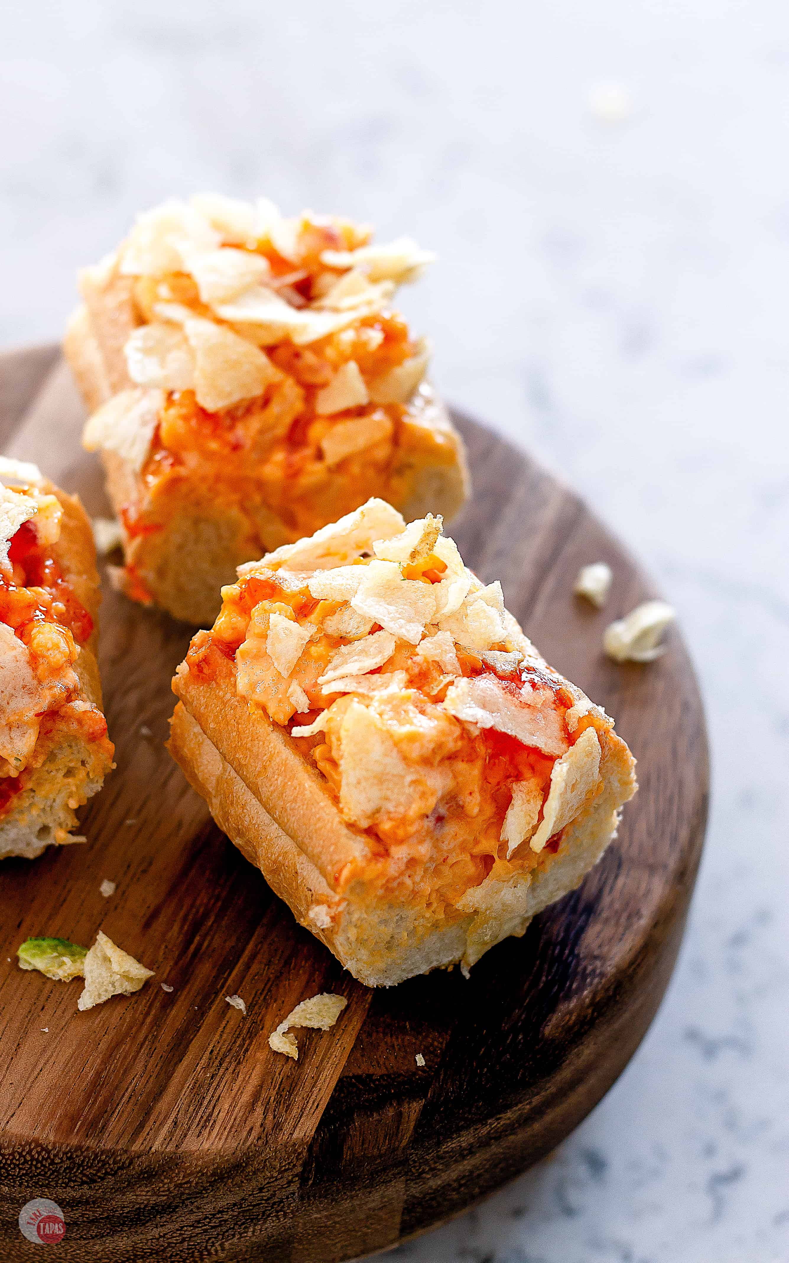 A few hearty slices of this Sweet and Spicy Pimento Cheese Bread and your party will rock! | Take Two Tapas | #PimentoCheese #BreadAppetizer #FrenchBread #PartyFoods #PepperJelly #SemiHomemade