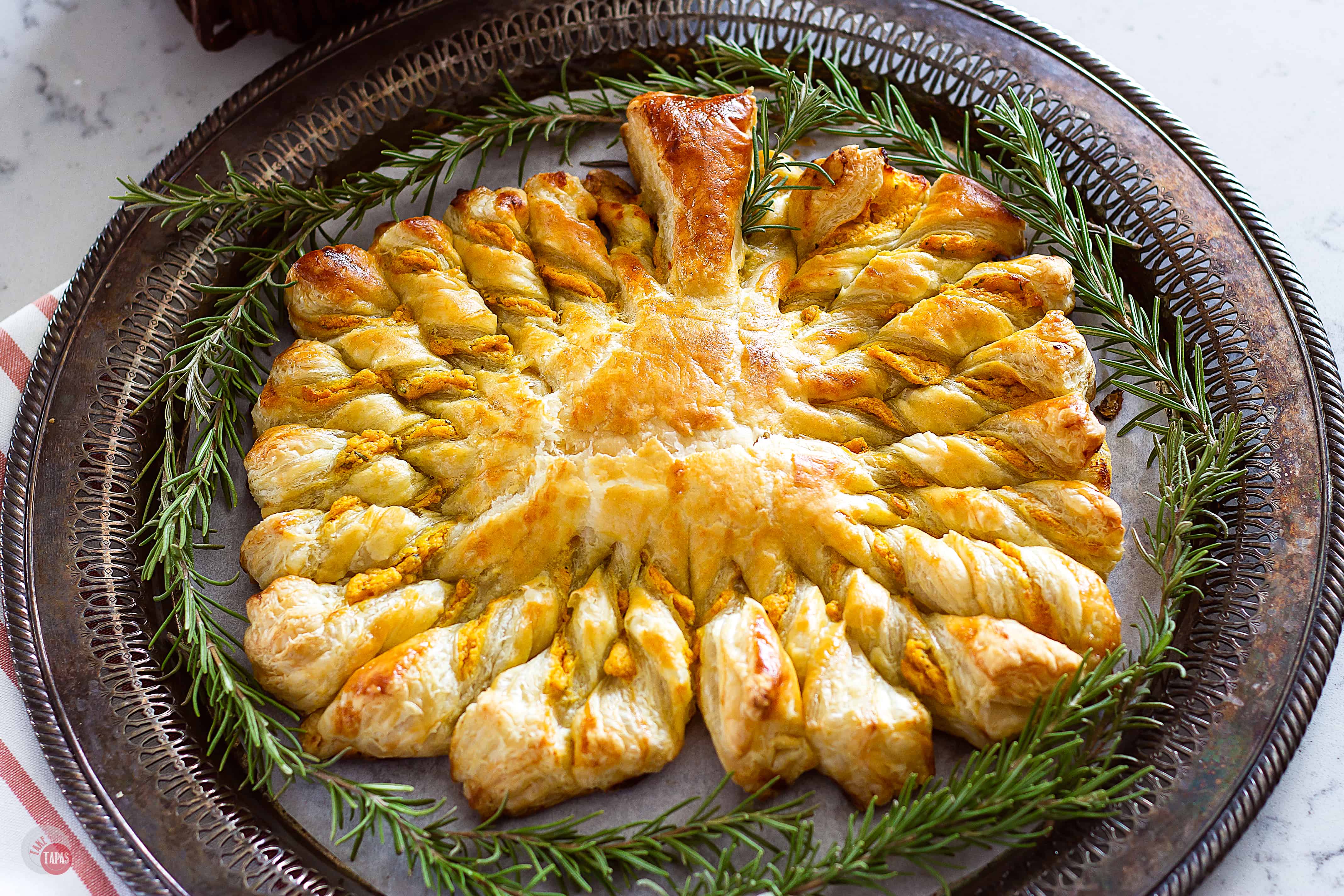 overhead shot of Easy Pumpkin Pull Apart Puff Pastry on a round platter