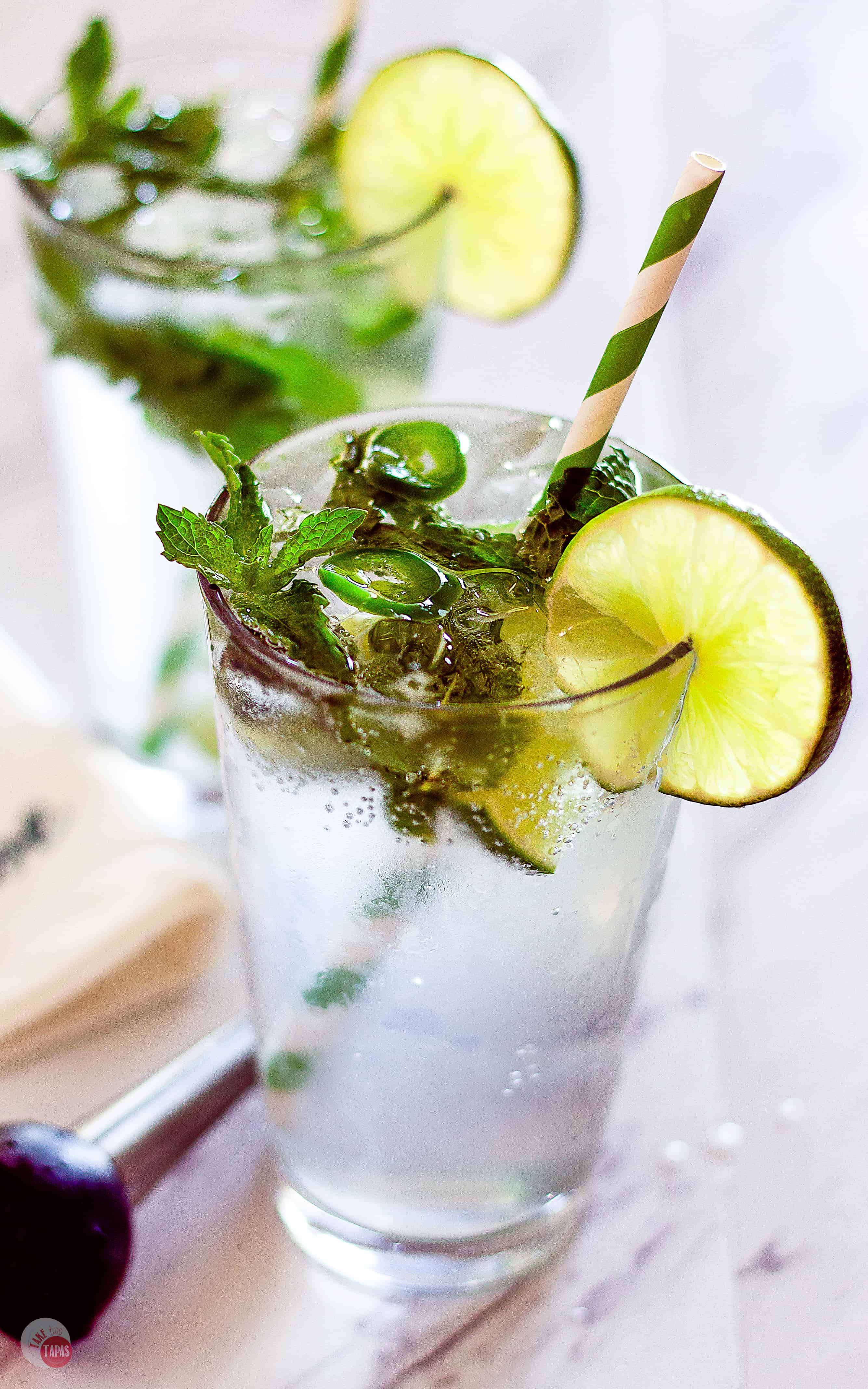 Bright and Refreshing Spicy Jalapeño Mojito Recipe | Take Two Tapas | #MojitoRecipe #RumCocktail #Mint #JalapeñoRecipe #CocktailRecipes