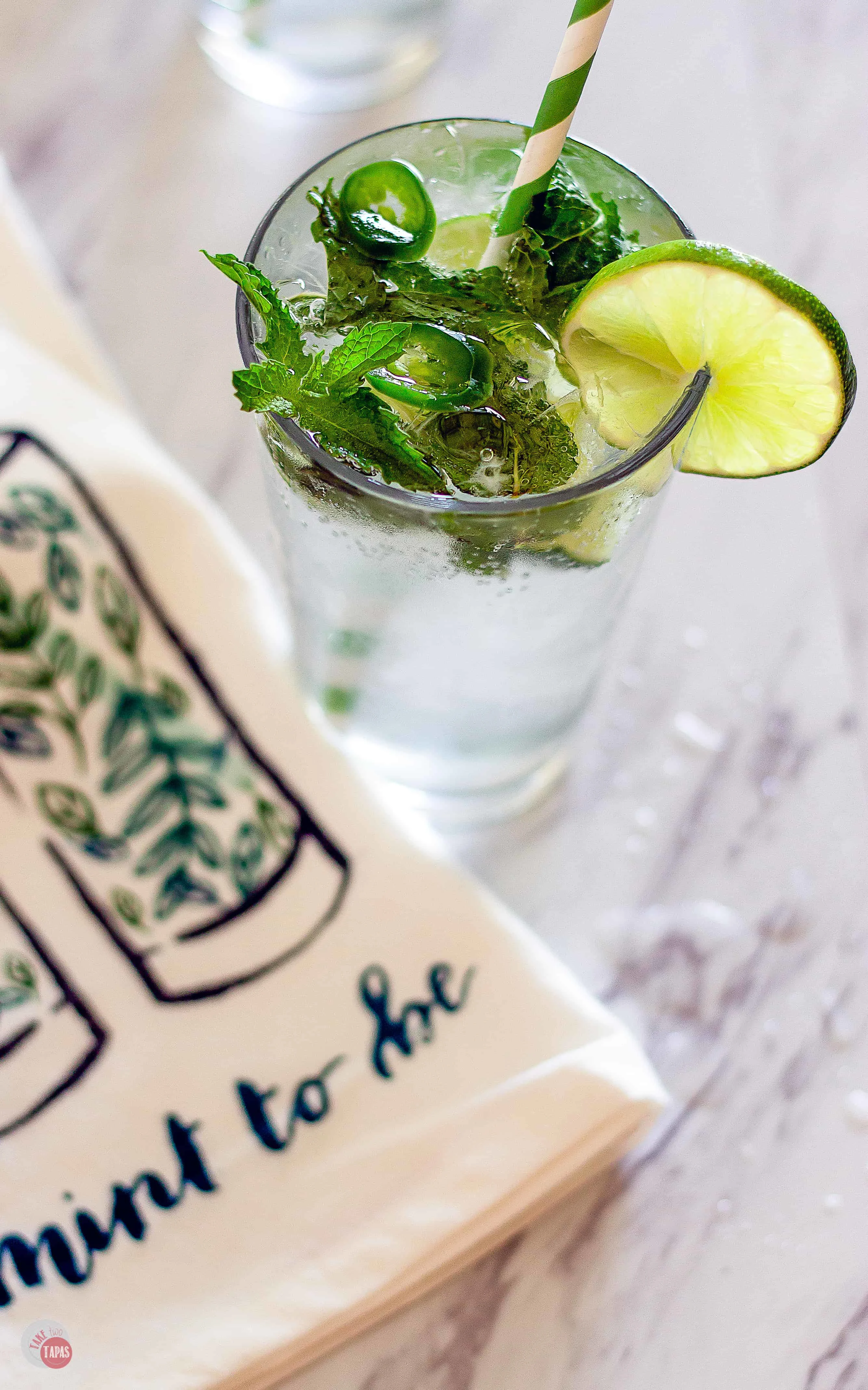 Enjoy a rum Spicy Jalapeño Mojito Recipe | Take Two Tapas | #MojitoRecipe #RumCocktail #Mint #JalapeñoRecipe #CocktailRecipes