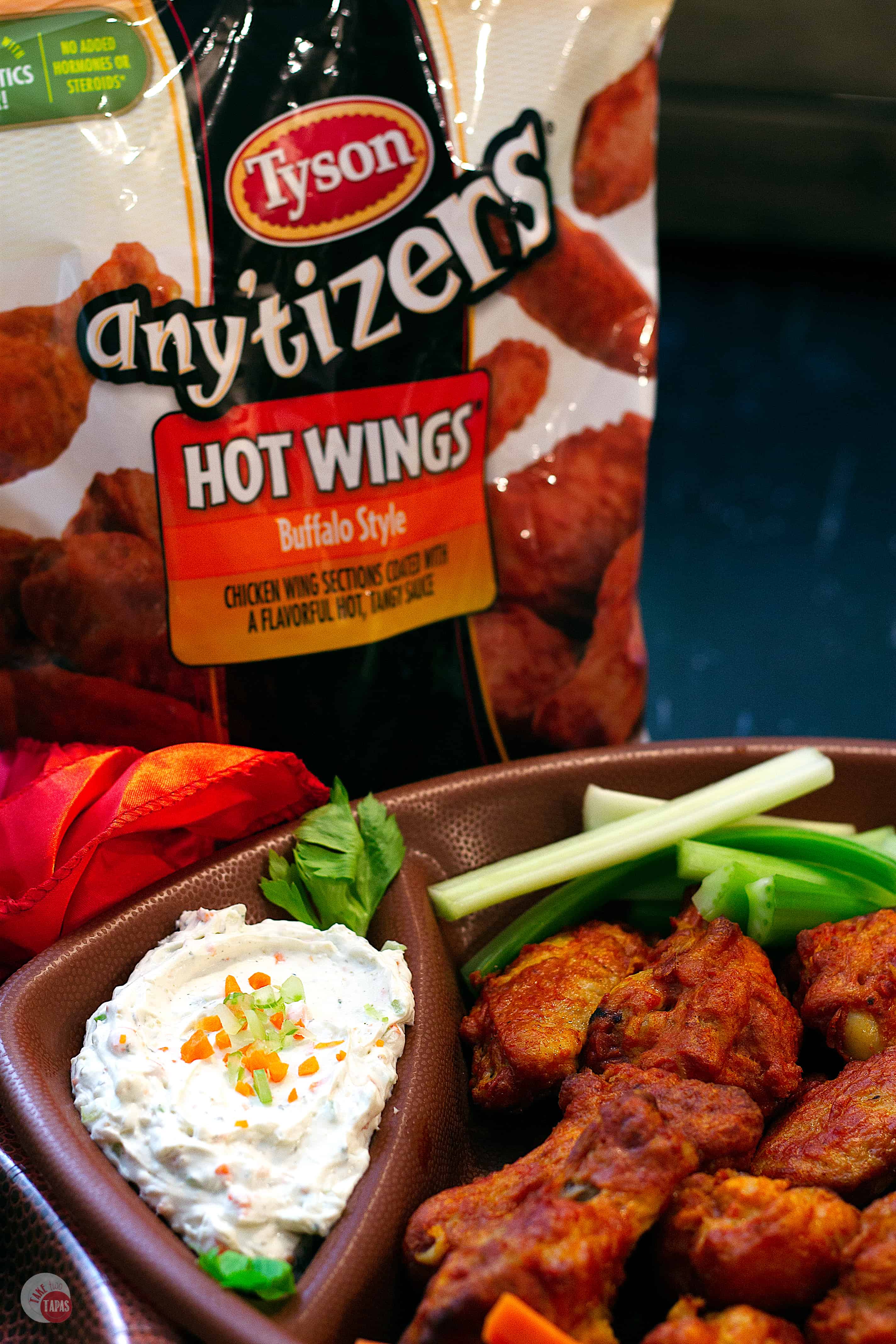 When the chicken wing dip debate rages on, come together over this Blue Ranch Chicken Wing Dip that is a combination of the two most popular dips.  Complete with a sprinkling of carrots AND celery! Tyson® Any’tizers® Hot Wings! #AD @TysonFoods #FallEntertainingWithTyson | Take Two Tapas | #ChickenWingDip #BlueCheeseRecipe #RanchDressingRecipe #Tailgating