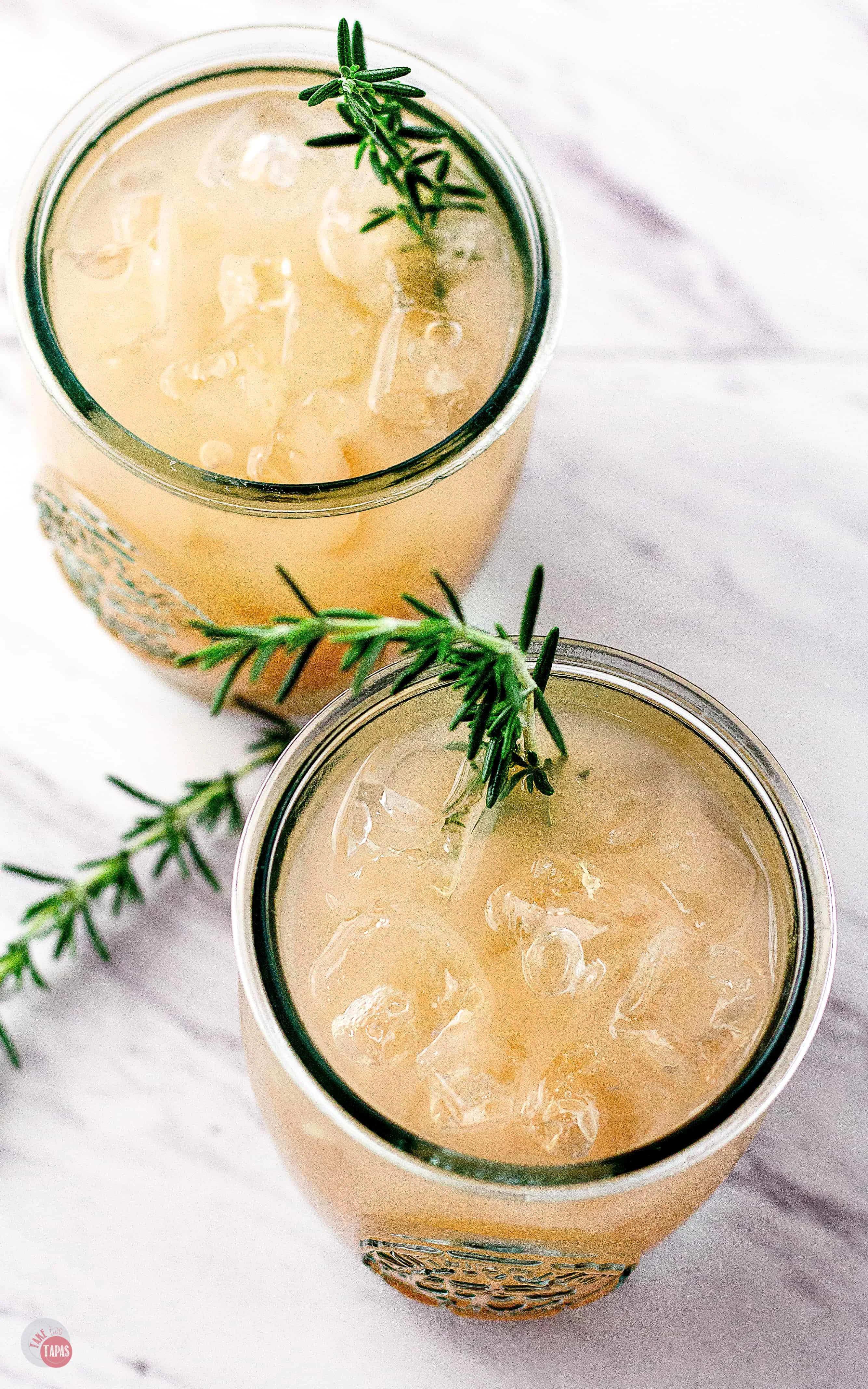 This Grapefruit Rosemary Rum Punch can be served as a single cocktail or a large batch punch! | Take Two Tapas | #Grapefruit #Rosemary #RumPunch #RumCocktails