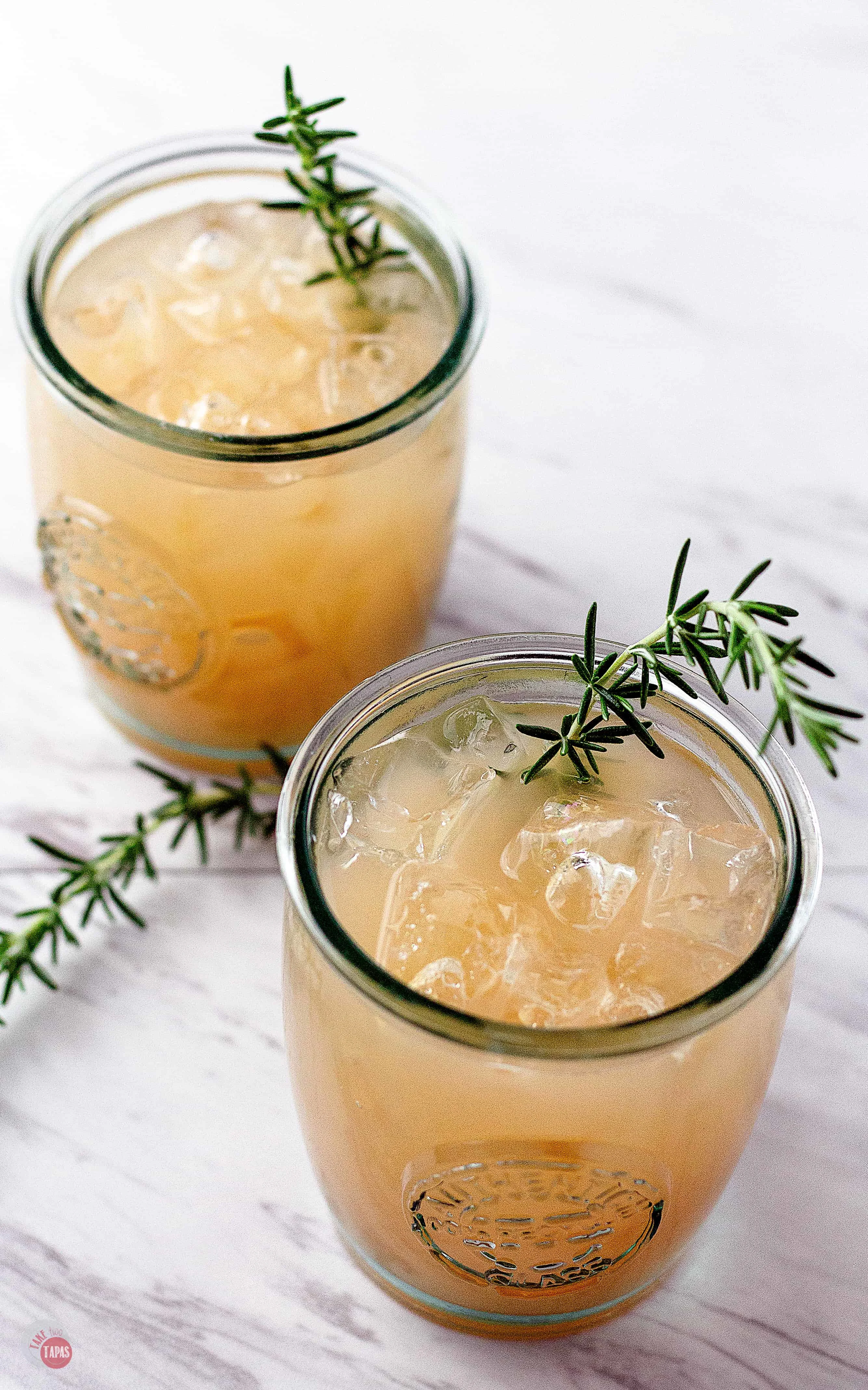 Liven up your holiday party with this tart and herbal Grapefruit Rosemary Rum Punch! | Take Two Tapas | #Grapefruit #Rosemary #RumPunch #RumCocktails