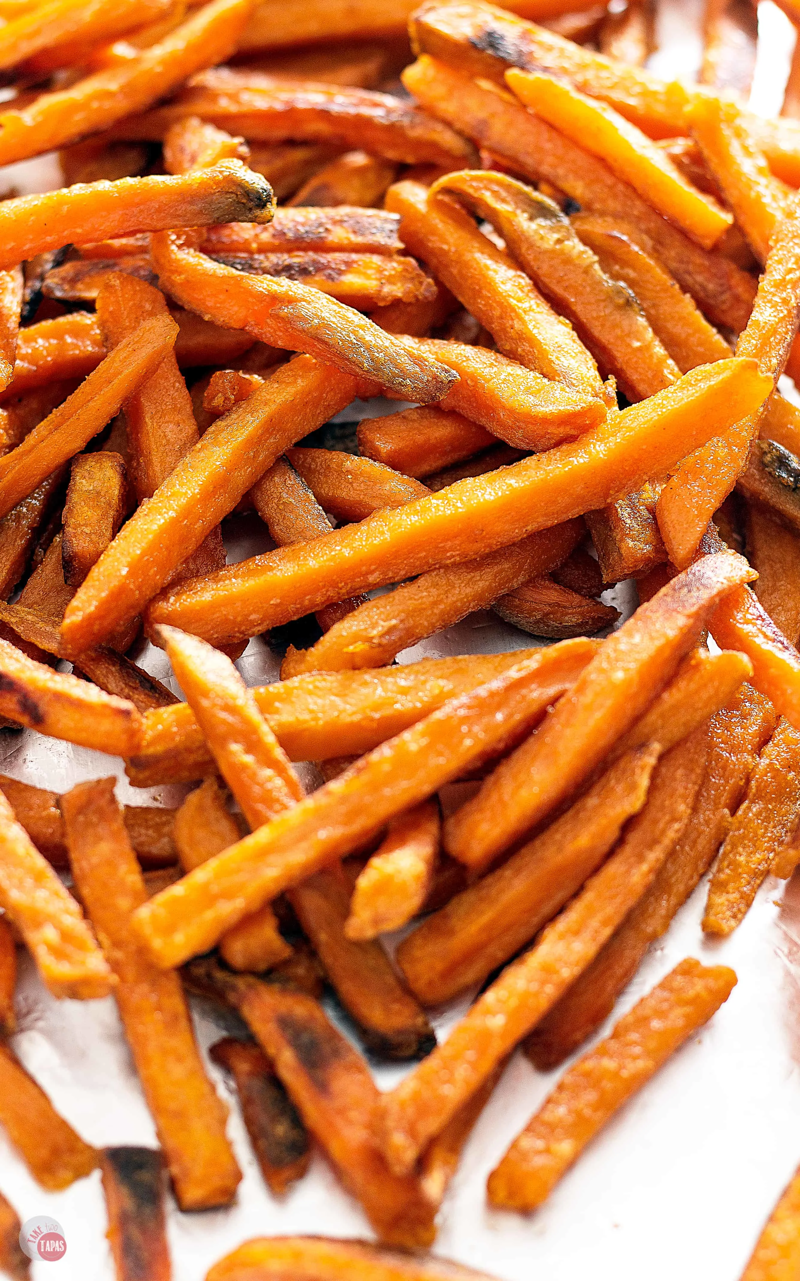 Sweet Potato Poutine starts with crispy baked sweet potatoes! | Take Two Tapas | #PoutineRecipes #SweetPotatoRecipes #FrenchFryRecipes