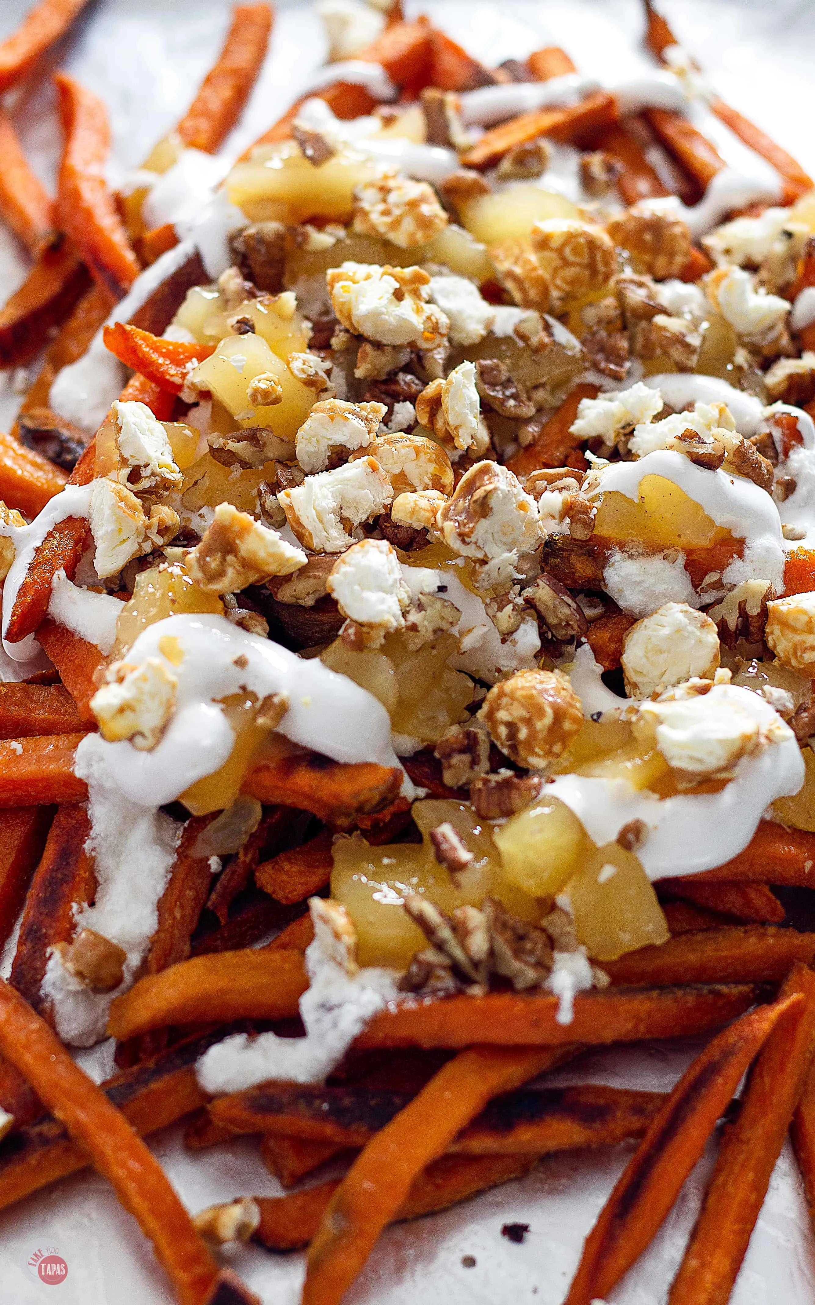 Halloween Poutine - A sweet potato french fries poutine recipe for the sweet side of life! | Take Two Tapas | #PoutineRecipes #HalloweenRecipes #SweetPotatoRecipes #FrenchFryRecipes