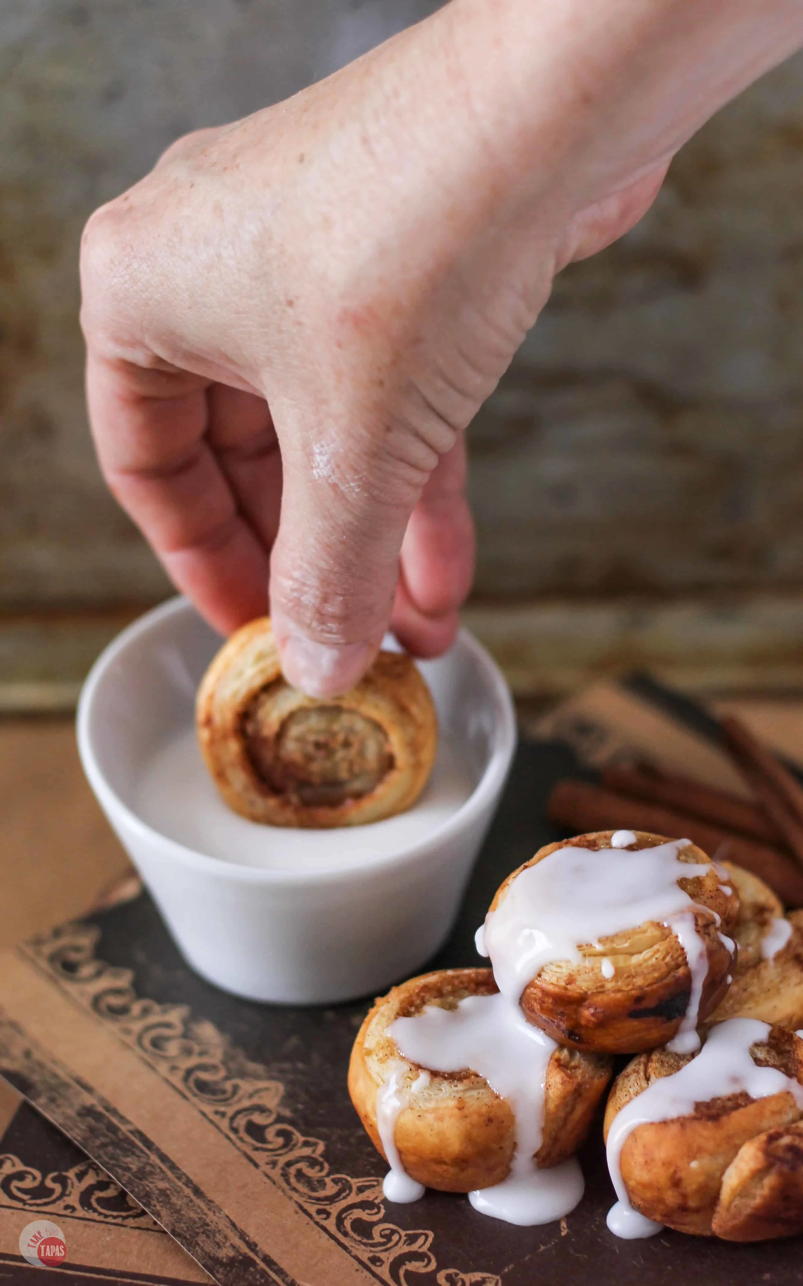 Mini Puff Pastry Cinnamon Roll Bites are perfect for that early morning tailgate party! | Take Two Tapas | #PuffPastry #CinnamonRolls #Breakfast #Breakfast #Tailgating