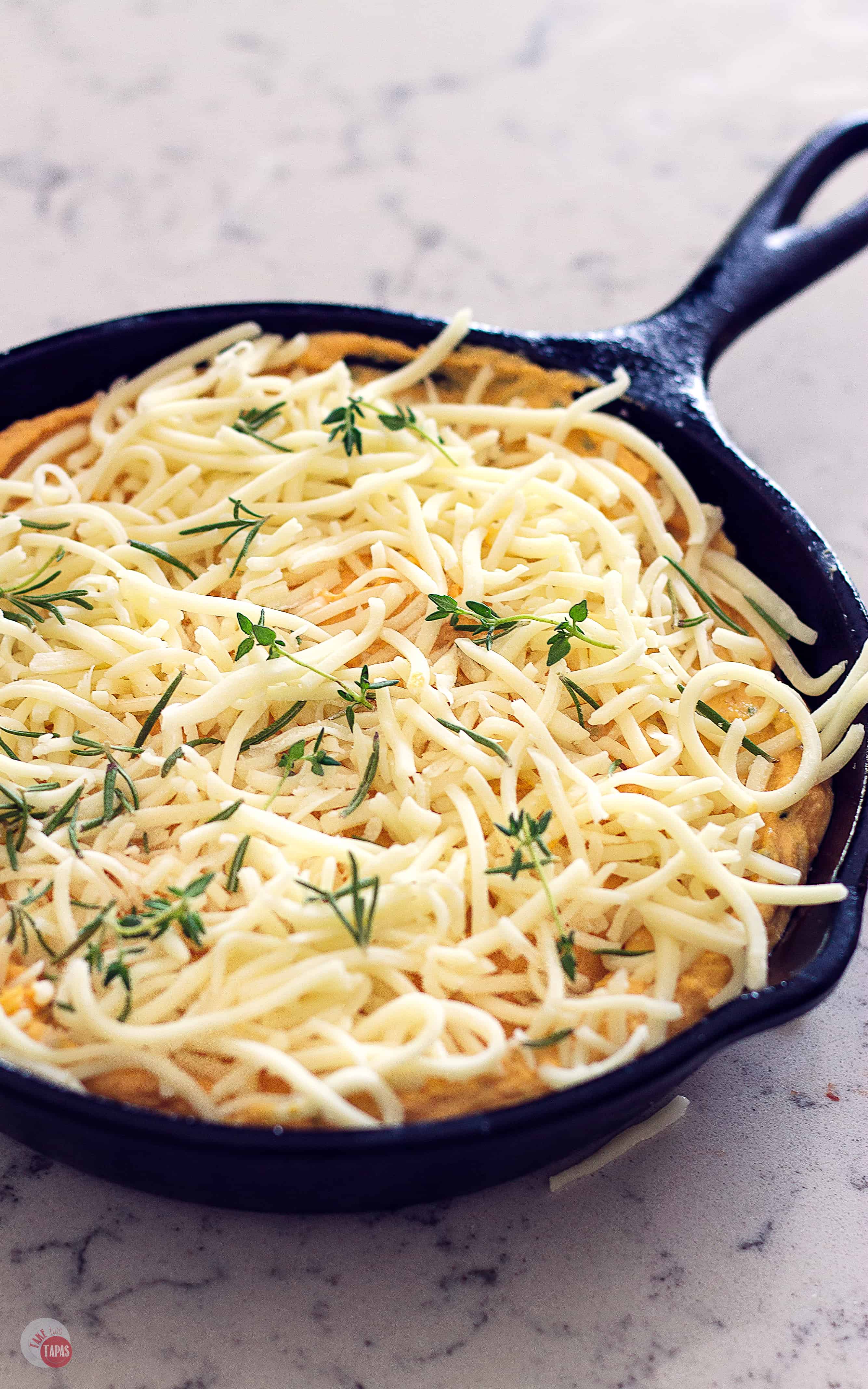 picture of cheese on top of pumpkin dip