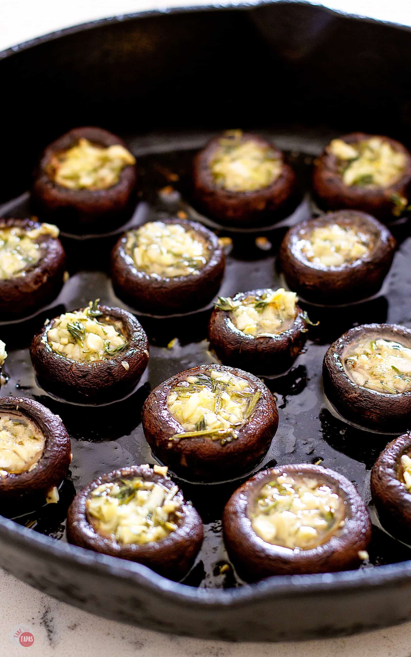 side view of Roasted Garlic Butter Mushrooms in a skillet