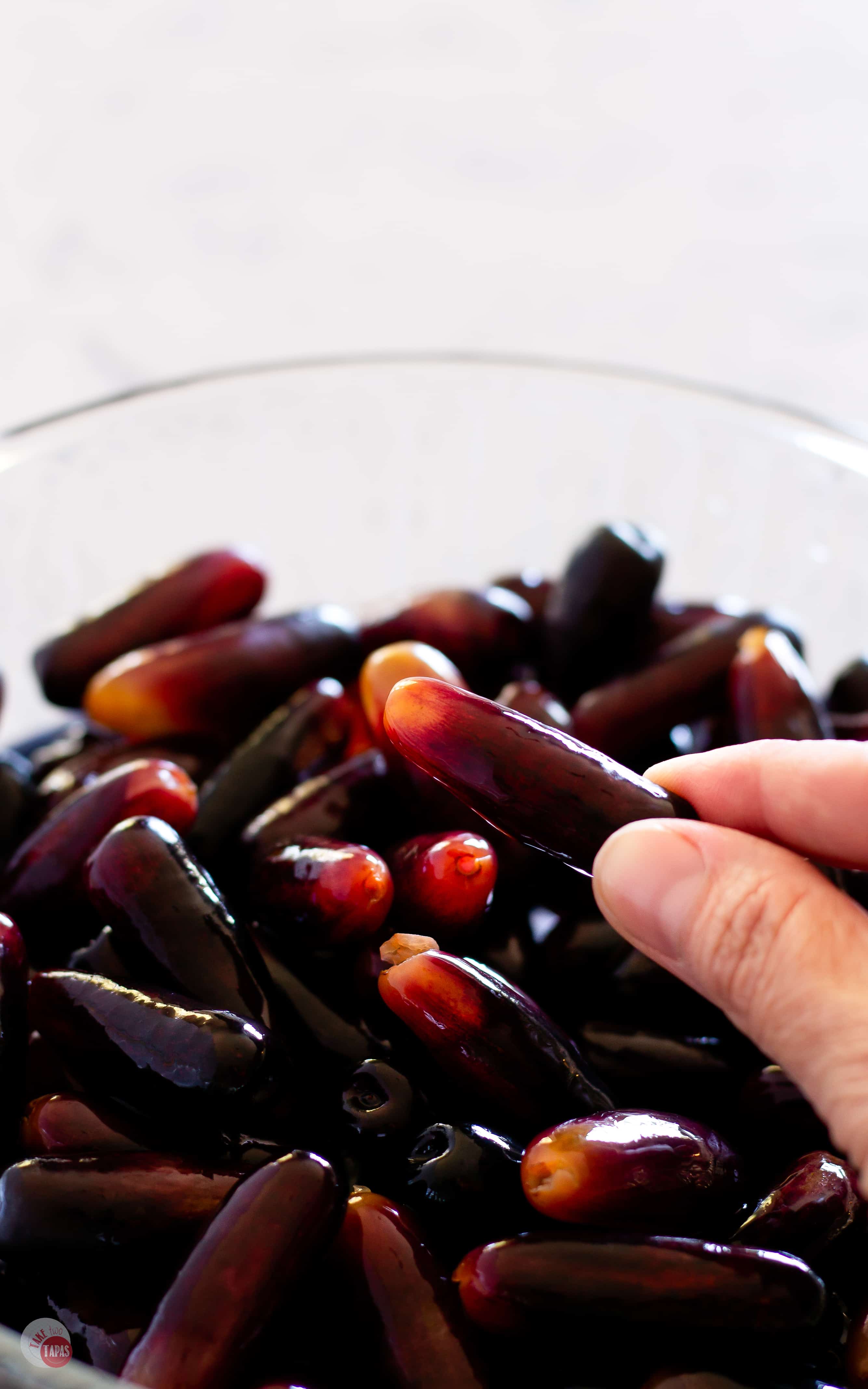 I chose Moon Drop grapes for these tequila infused grapes for my Halloween party because they look like toes. | Take Two Tapas | #TequilaRecipe #DrunkGrapes #BoozySnacks