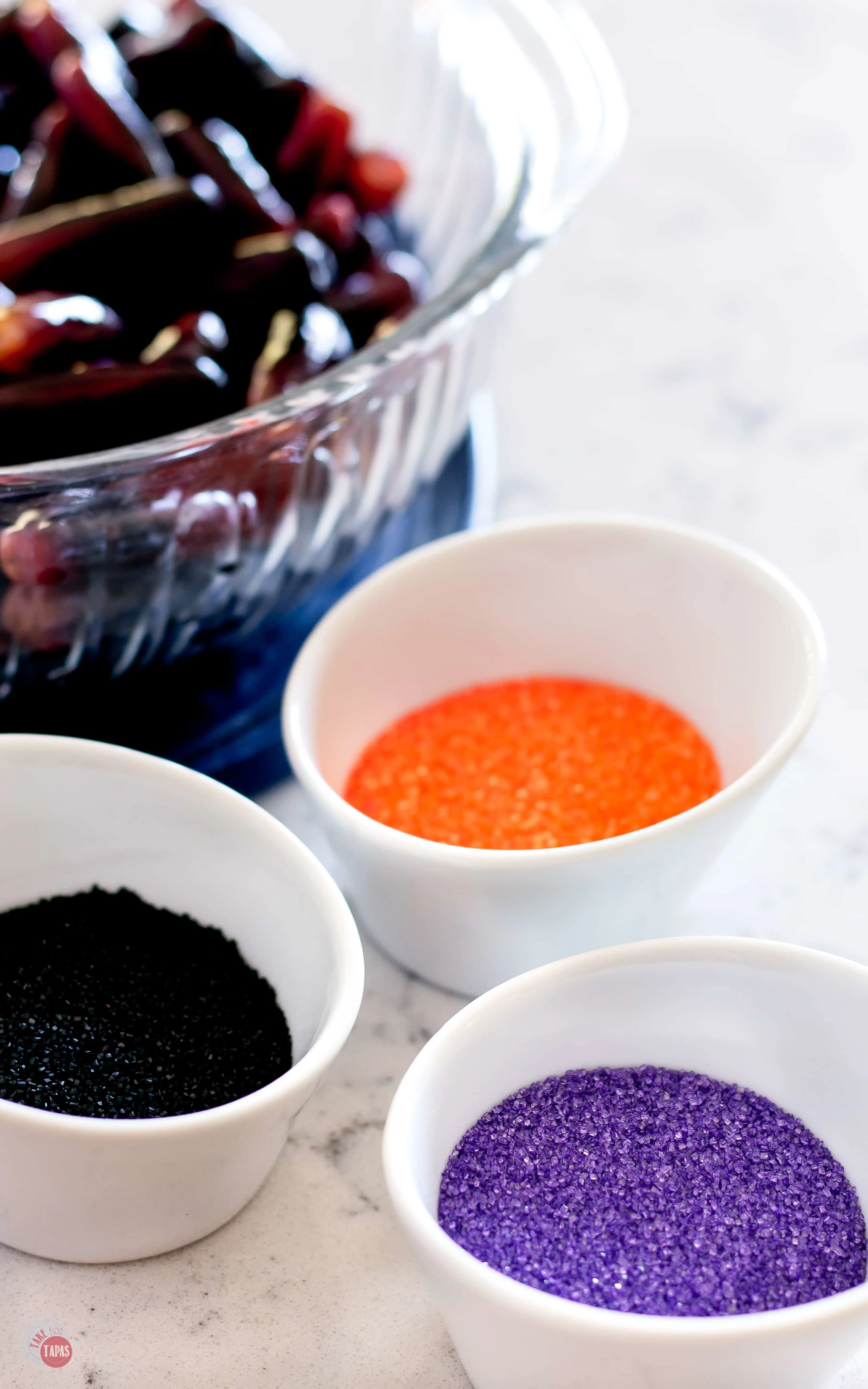 Choose sugars with colors to match your event for these tequila infused grapes. | Take Two Tapas | #TequilaRecipe #DrunkGrapes #BoozySnacks