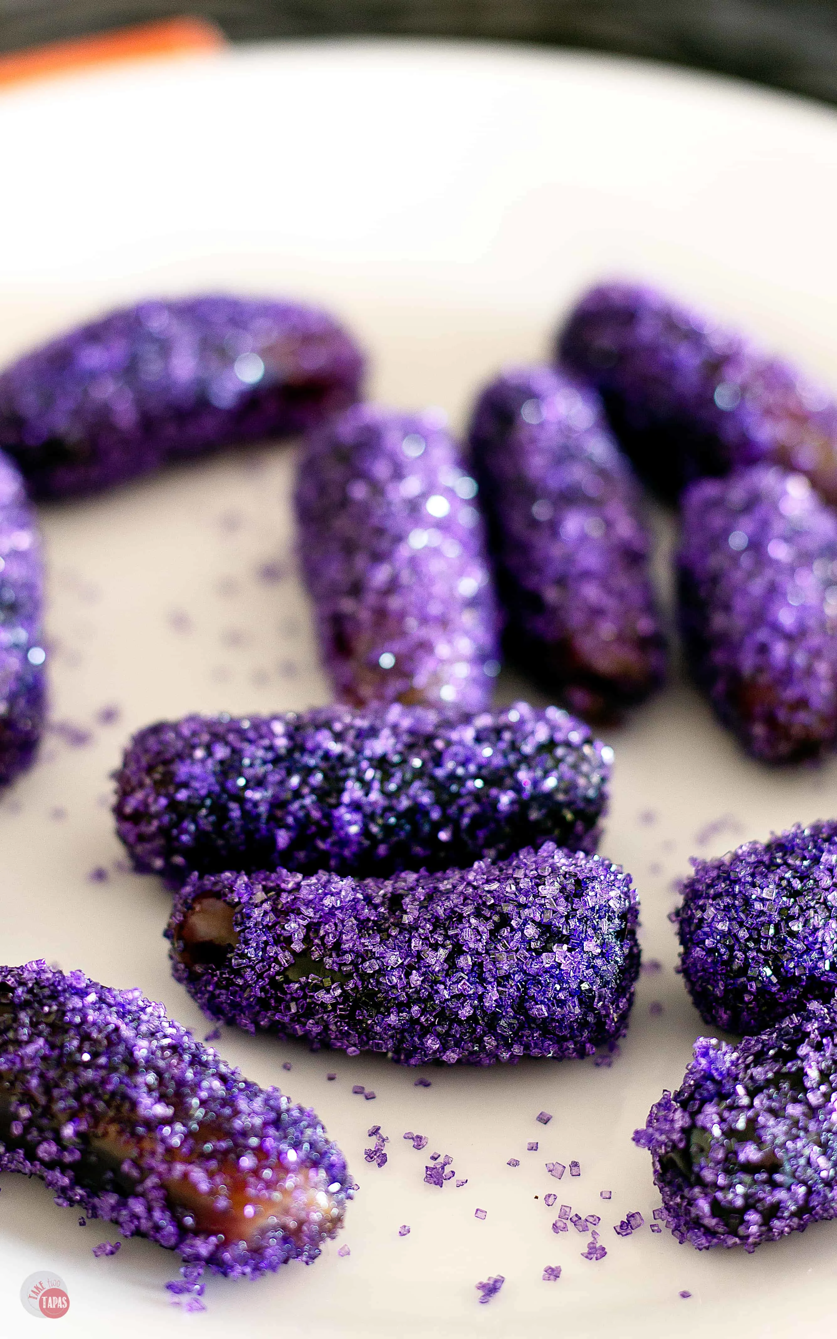 Switch up the colors of the sugars or sprinkles to make these tequila infused grapes fit any party or theme! | Take Two Tapas | #TequilaRecipe #DrunkGrapes #BoozySnacks