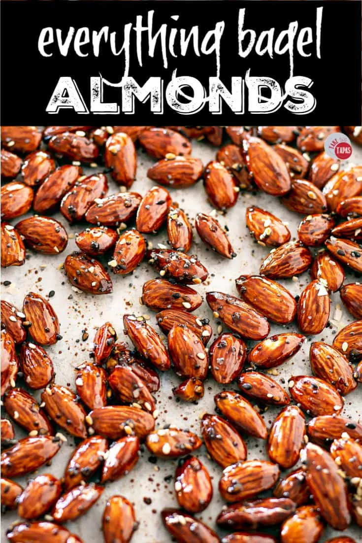 glazed nuts on a sheet with text "everything bagel almonds"