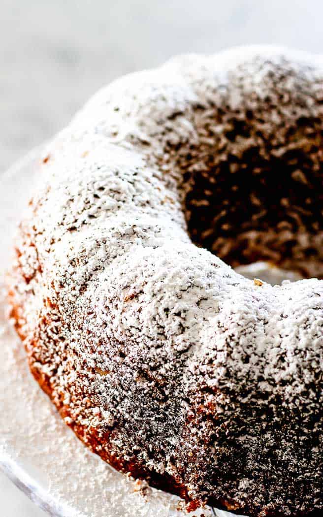 close up of bundt cake covered in powdered sugar