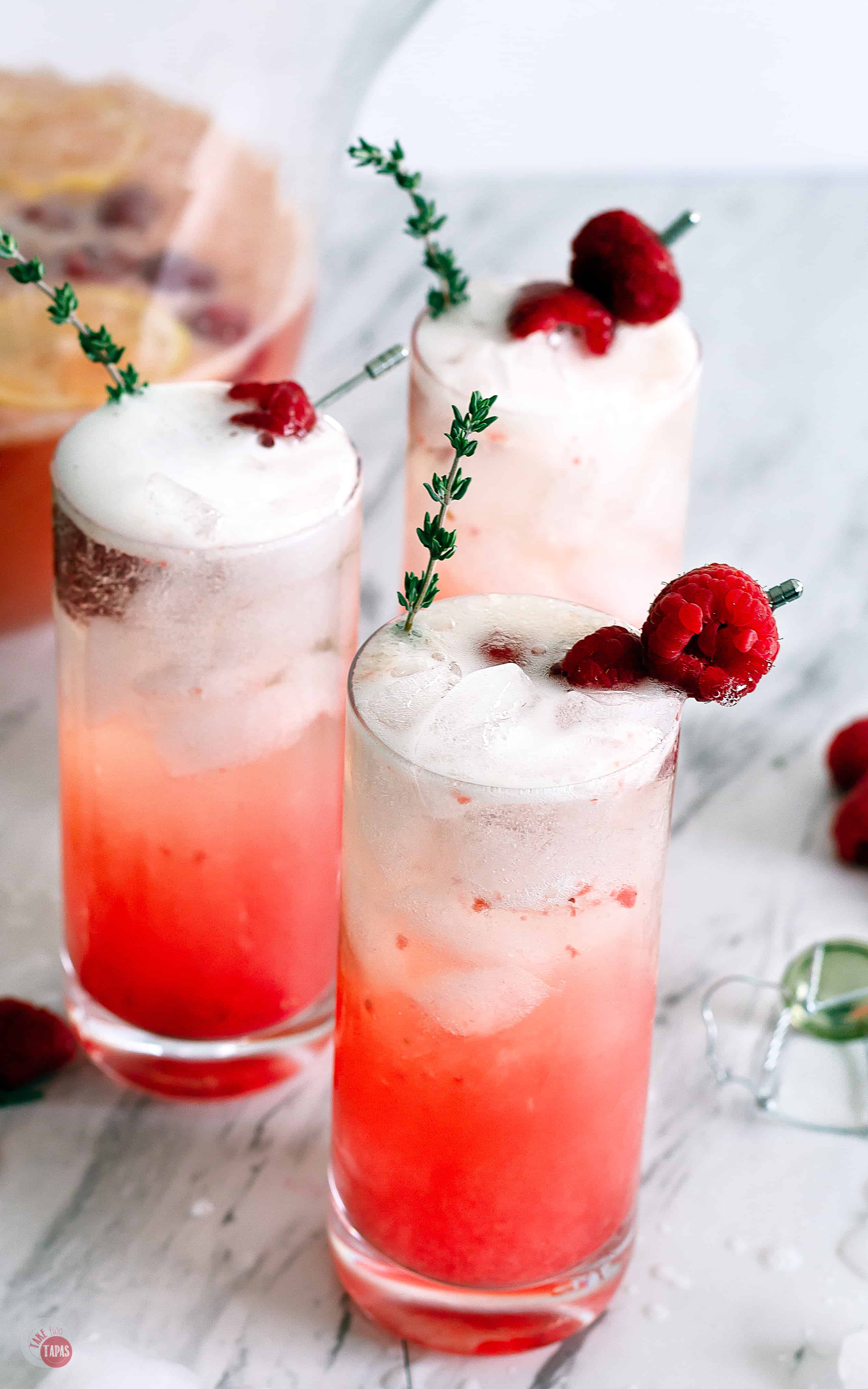 Raspberry Thyme Prosecco Punch can be a cocktail or a mocktail for all parties! | Take Two Tapas | #PunchRecipe #ProseccoCocktail