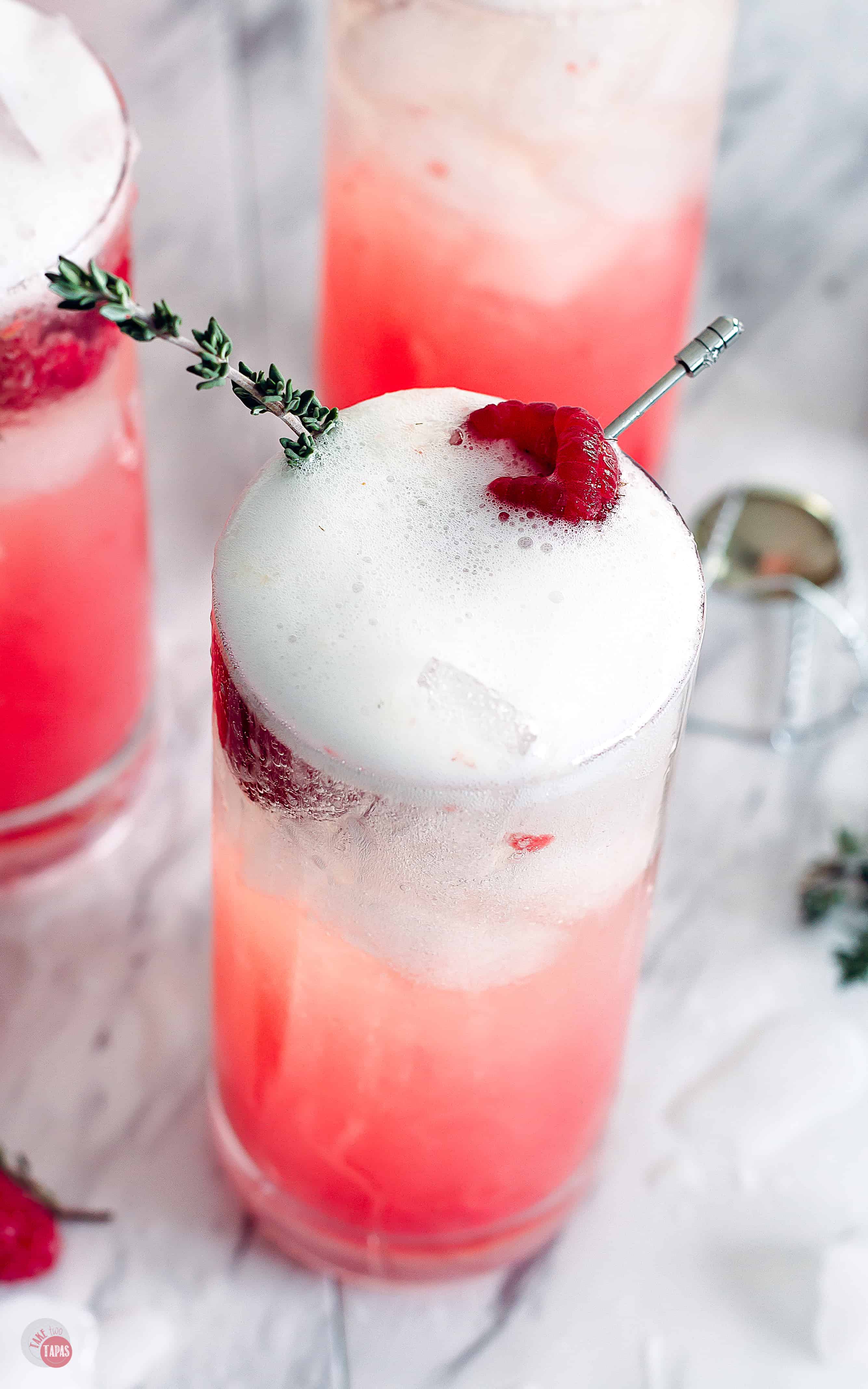 Raspberry Thyme Prosecco Punch is perfect for all your holiday parties!! | Take Two Tapas | #PunchRecipe #ProseccoCocktail