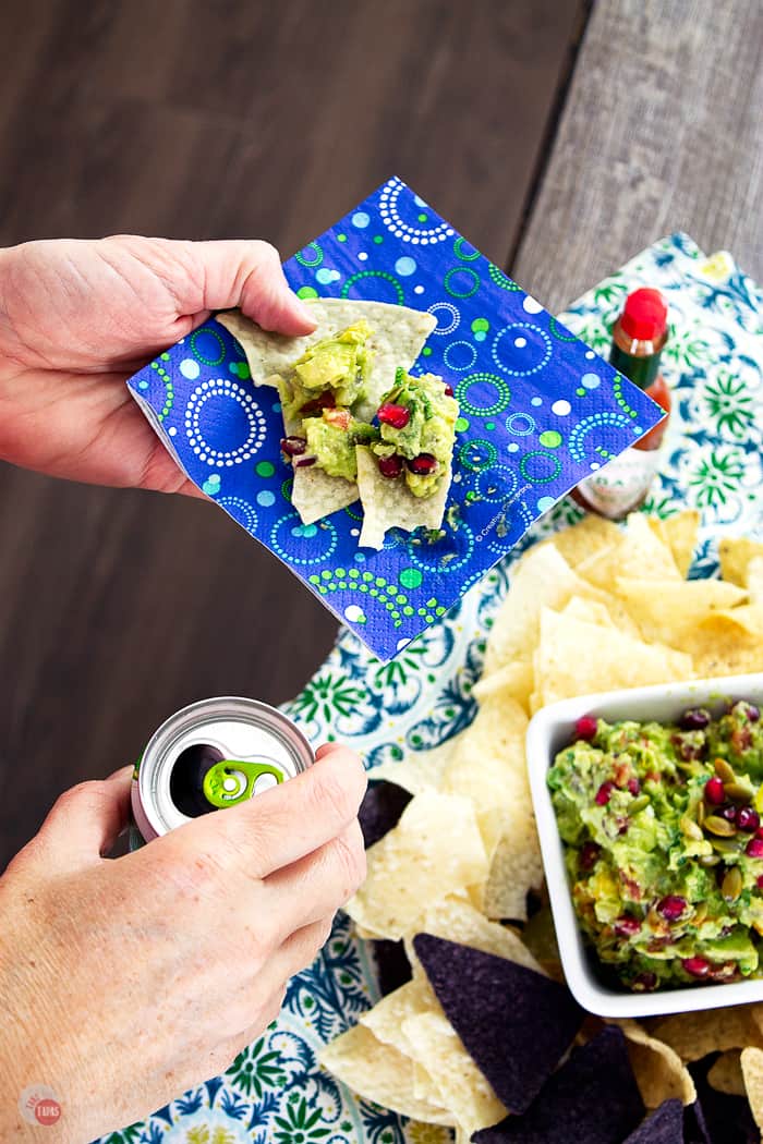 Sweet and Spicy Pomegranate Guacamole is the perfect way to start a party with creamy avocados and tart pomegranate seeds. | Take Two Tapas | #Guacamole #Pomegranate #SavorWinningFlavors #AvocadosFromMexico #HAVEARITA #FlavorYourWorld