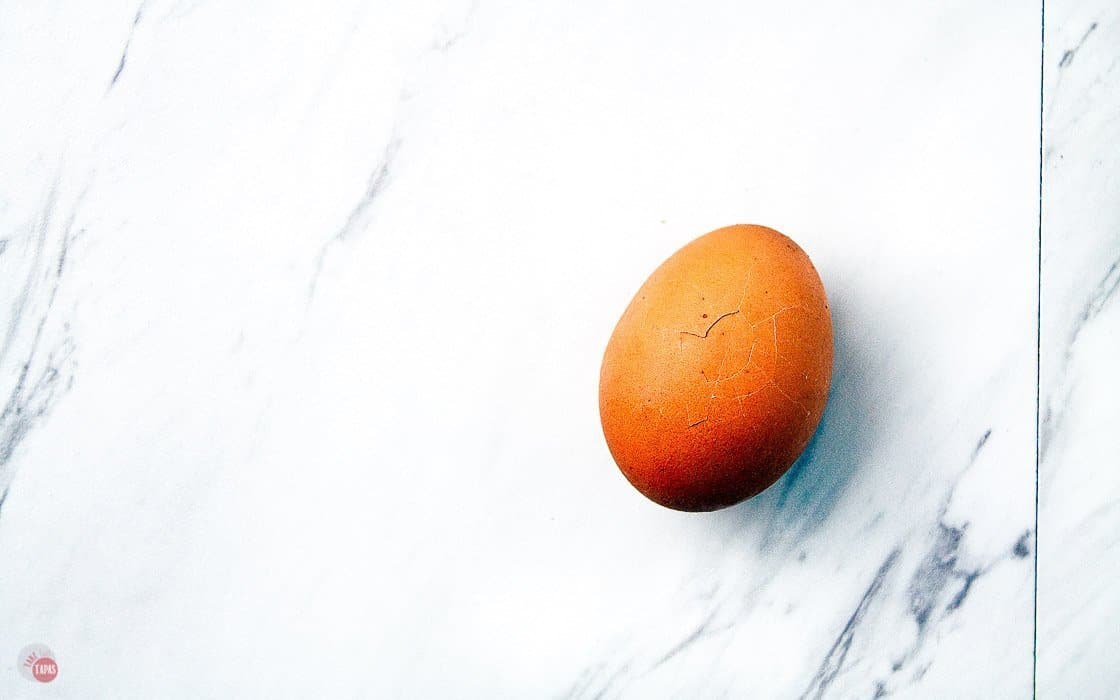 overhead picture of cracked hard boiled egg