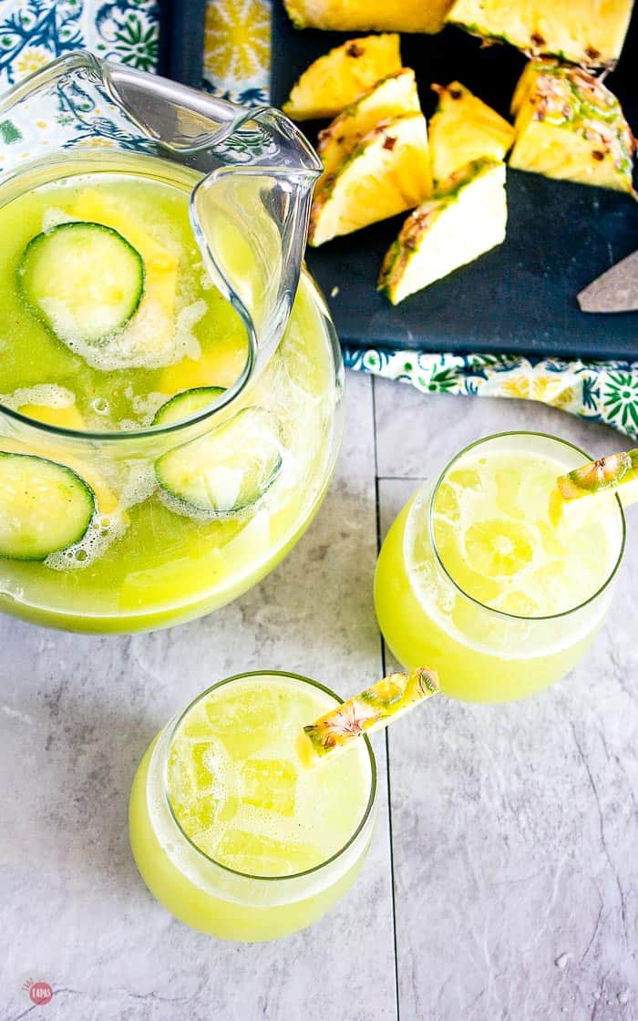 overhead shot of pitcher of pineapple cucumber rum punch