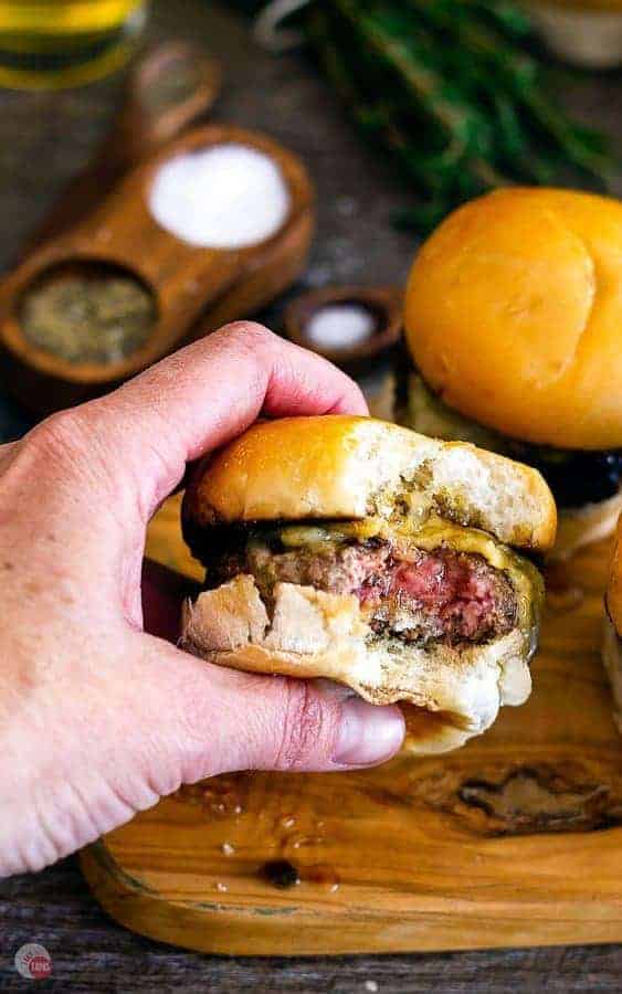 hand holding a lamb slider