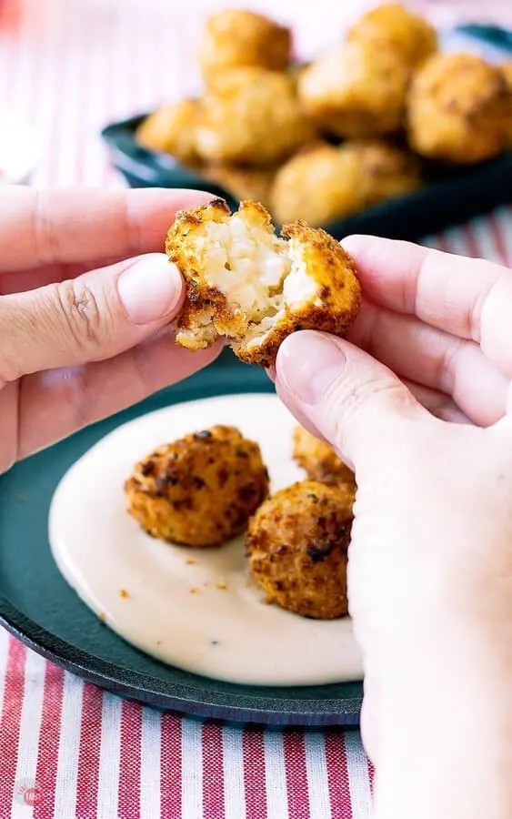 the inside of an Italian cheesy alfredo arancini rice ball!