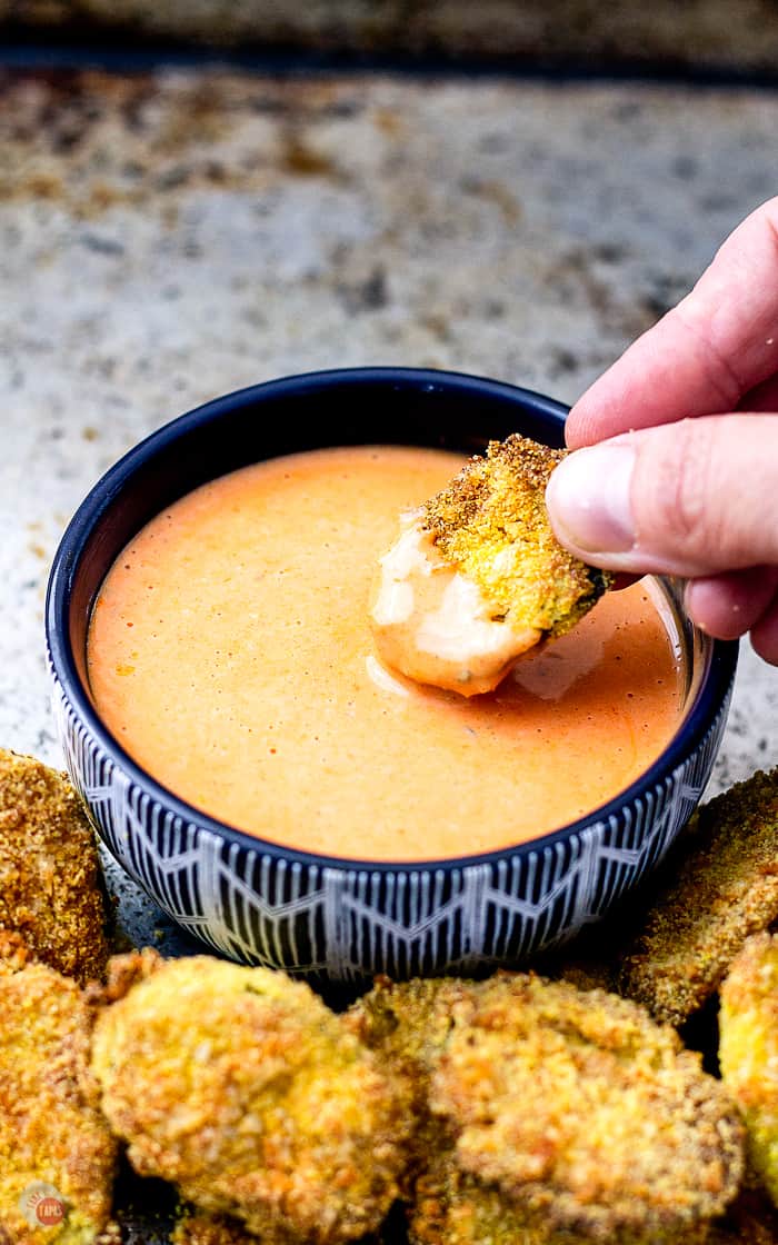 dipping fried pickles in dip