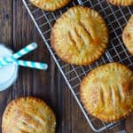 Caramel apple hand pies on cooling rack