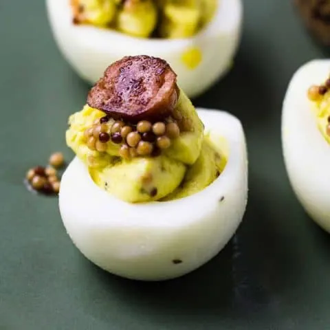 Smoky Honey Mustard Deviled Eggs with Pickled Mustard Seeds