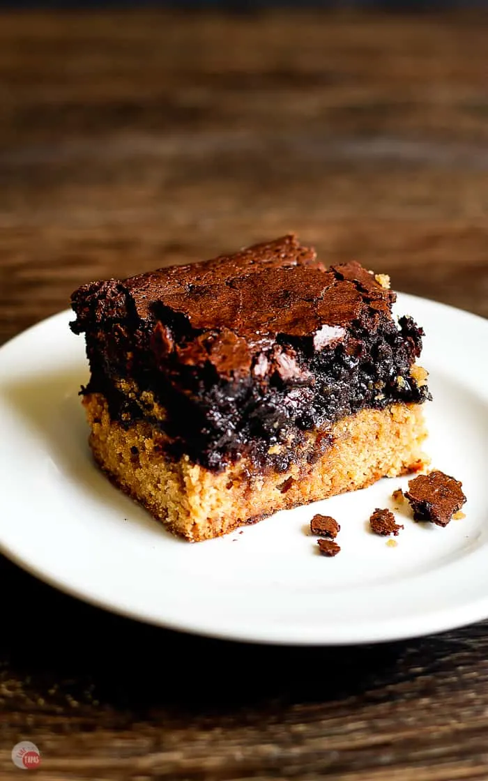 side view of peanut butter Oreo brownie bar on a white plate